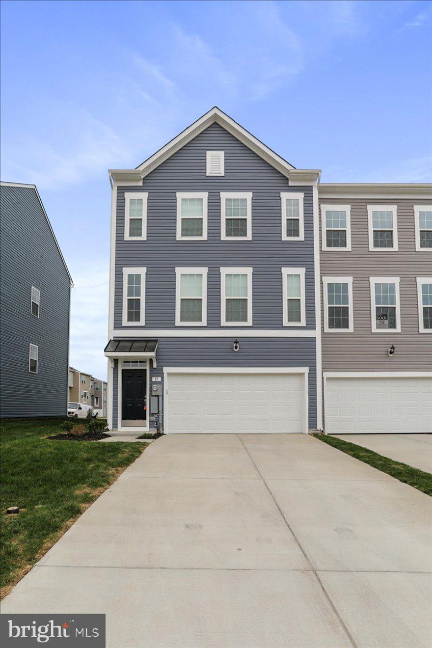 Ready to Move In! Overlook at Riverside - Brand New Townhome - End Unit

This stunning townhome features  End Unit 4 bedrooms and 3.5 baths. Upon entry, you'll find a finished Recroom with a full bathroom adding extra space. The main level boasts luxury vinyl plank flooring throughout, a spacious living room with a powder room, and an eat-in kitchen with an island, granite countertops, stainless steel appliances, and a spacious deck.

The primary suite includes a generous walk-in closet and an en suite bath with a dual sink vanity and an oversized seated shower. The upper level is completed by two secondary bedrooms, a full bath, a linen closet, and a centrally located laundry room.

Additional features include a double car garage, a large driveway that can accommodate four cars, and additional guest parking. The community offers free amenities such as a dog park, children's park, basketball court, tennis court, and recreation area.

Located in a prime spot for I-81, Rt 11, and I-70 commuters, this home offers mountain views, is within walking distance to shopping and restaurants, and provides access to Spring Mills schools. It's also close to the interstate and just minutes from the MD line. This rental won't last long!