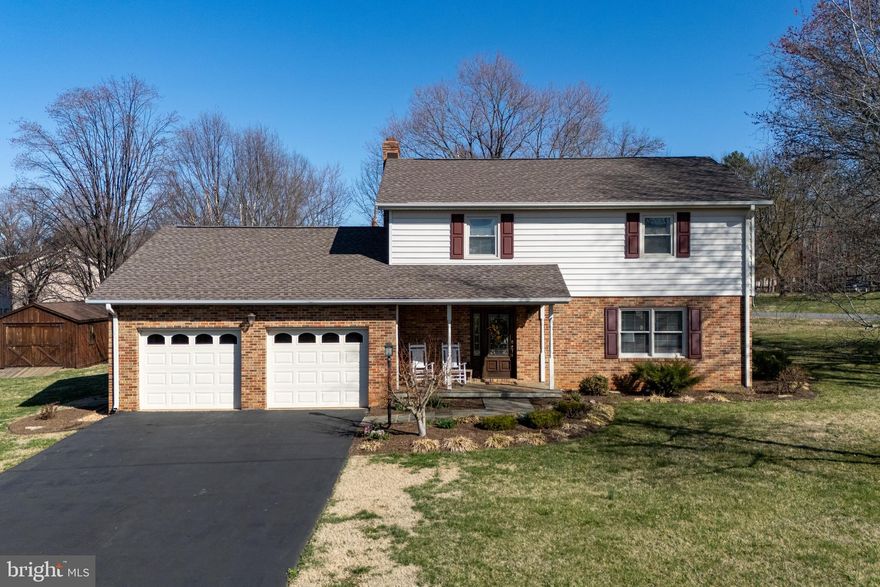 Welcome to this beautifully updated 3-bedroom, 2-and-a-half-bathroom home with 1,972 square feet in the sought-after Old Farms subdivision! Located just off Highway 211, it offers easy access to shopping, dining, and outdoor activities, along with stunning mountain views from the front porch. Inside, the spacious living room features a stone wood-burning fireplace with a heatilator, creating a cozy atmosphere. The remodeled kitchen is a highlight, with granite countertops, tile floors, a stylish backsplash, two large pantries, and stainless steel appliances—perfect for both cooking and entertaining. The large primary suite upstairs includes a gas log fireplace and a private en-suite bathroom with a Jacuzzi tub, separate shower, and large vanity for a spa-like experience. Two additional bedrooms offer ample space and easy access to the second full bathroom. Outside, the well-maintained yard offers privacy and a relaxing atmosphere, with a front porch to enjoy the mountain views and a back patio for outdoor living. The peaceful Old Farms subdivision is perfect for those seeking a serene setting. With its ideal location, beautiful updates, and cozy features, this home is truly a place you’ll want to call your own!