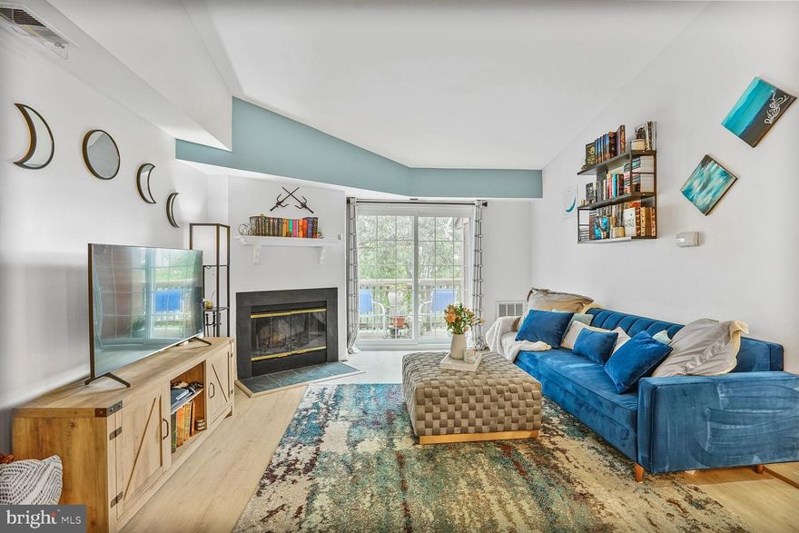 Welcome to this bright and spacious top-floor condo, perfectly nestled among the treetops! You’ll love the modern kitchen featuring sleek quartz countertops and high-end Samsung and Bosch stainless steel appliances—ideal for cooking and entertaining. The open-concept living and dining area boasts vaulted ceilings, beautiful new LVP flooring, new windows plus sliding door and a cozy fireplace that makes the space feel like home.

Step out onto your private balcony with peaceful views of the park and woods—plus extra storage space! The unit offers two generously sized bedrooms, including a primary suite with a walk-in closet and an updated bath featuring a relaxing soaking tub. There's also a newly renovated full hallway bathroom and a convenient full-size washer and dryer in-unit. Freshly painted and move-in ready!

Enjoy the convenience of your own dedicated parking space located right in front of the building—no more long walks or searching for a spot!

Whether you're looking for your next home or a smart investment, this property checks all the boxes. It’s an excellent rental opportunity in a sought-after area!

Enjoy all the amenities this welcoming community has to offer, with easy access to the metro via shuttle, and just minutes from Kingstowne, I-95, and I-495. Don’t miss this one!