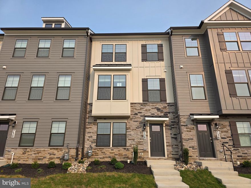 Stunning immediate delivery Norris townhome offers the perfect blend of modern design, urban convenience, and unbeatable amenities, all just minutes from the vibrant heart of Frederick. This spacious and stylish 4 bedroom, 3.5 bath townhome features an open-concept layout that is perfect for entertaining. High-end finishes and contemporary design elements make this home truly stand out. A two-car garage provides private parking and additional storage space. Located within walking or biking distance to Historic Downtown Frederick, this home offers easy access to boutique shops, breweries, restaurants, and entertainment. Frederick is also recognized as one of the most dog-friendly cities in the United States. Renn Quarter is designed to be more than just a neighborhood; it is a destination. Planned community amenities include swimming pools, a clubhouse, parks, playgrounds, picnic pavilions, dog parks, walking trails, soccer fields, and open green spaces. Residents will also enjoy on-site shops, and restaurants. This beautiful home is ready for its first owner. Do not miss the opportunity to own a brand-new townhome in one of the most exciting and fast-growing areas of Maryland. Contact us today to schedule a private tour and ask about our exclusive incentives.