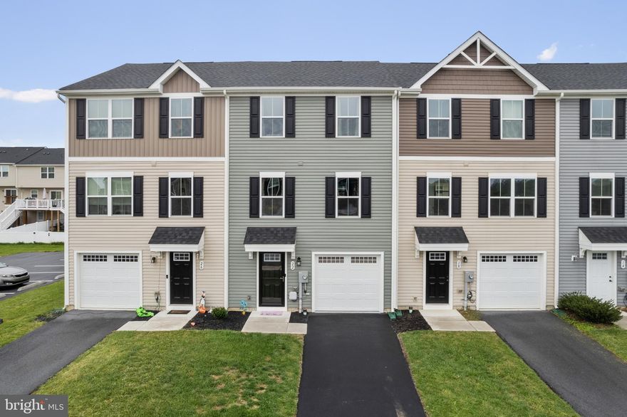 Almost Brand New Townhome In Desired Location Of Martinsburg WV, Berkeley County!  Classy, Open And Spacious Rooms, Upgraded Flooring In Kitchen And Bathrooms. Clean And Move In Ready, 3 Bedrooms And 2.5 Bathrooms! Pride Of Ownership!  Main Level Has Spacious Kitchen With Room For An Island. Eat In Kitchen, Upper Level Boasts Primary Bedroom And Bath And 2 Additional Bedrooms. Basement Is Fully Finished With Storage Area And Built In Bar!  Level Lot, Great Location!