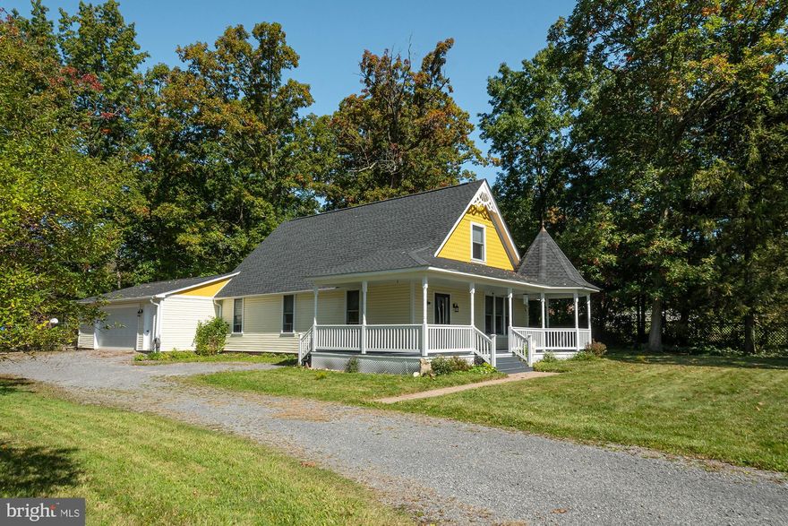 Beautiful 3 bedroom, 3/1 bath home in historic Mountain Lake Park!  Each of the bedrooms has it's own full bathroom with the large primary bedroom located on the main floor.  You will find plenty of storage space in this home including an attached oversized 2 car garage with additional space above.  Enjoy relaxing on the covered front porch or spending time outside in the nice-sized side/backyard area.  Just a few steps from the backyard, you will find the town park and playground!  Lots of recent upgrades are also featured on this home including:  a new roof, fresh exterior paint, new flooring throughout the home, and a new fence around the backyard!!  This home truely has it all and is ready for you!  Don't miss out on this incredible opportunity, call today to schedule your private tour!