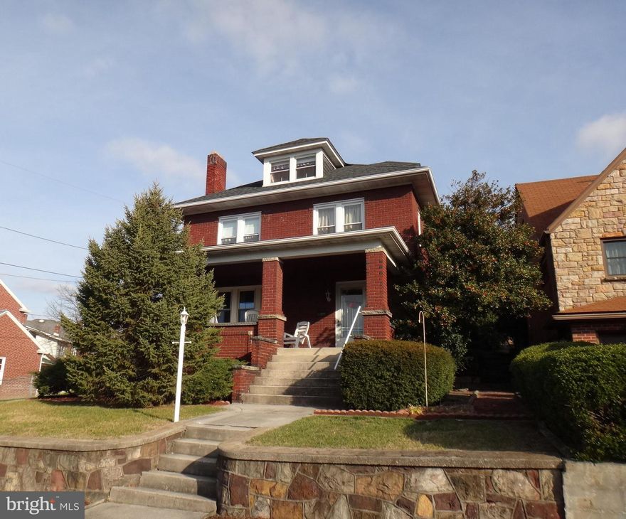 Traditional 20th century brick home located in a suburban neighborhood.  Throughout the house is original woodwork, wood doors and hardwood floors, all of which are in excellent condition. The main level includes a large living room with a brick fireplace , separate dining room, kitchen with 2 sinks, plenty of counterspace and glass shelves. On the second level are 3 bedrooms, den/sewing room (with access to a rear, balcony porch), and full bathroom.  The home features a finished attic with its own full bathroom! The attic has been used as a bedroom, but would make a perfect home office or studio (use your imagination)! The house also has a covered front porch, rear concrete and brick patios that lead up to a small grass yard. The list goes on! Come see today!