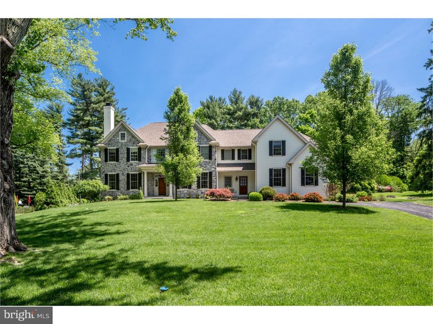 This impeccably built 5 bedroom, 4.2 bath manor home sits on a lovely, quiet lane in a convenient location near all local amenities. Being newer than most homes in the area affords you all the benefits of modern development & finishes, along with the lower maintenance that goes with it. The parklike grounds can be enjoyed from the large patio the owners extended, with a built-in outdoor grill to facilitate regular BBQs. The setting is enhanced by the lush landscaped lawn that provides a great outdoor space for entertaining & flat yard for all to play. A gracious foyer introduces a fine blend of warmth & contemporary elegance with rich wood floors, beautiful moldings, openings to main rooms & glass doors to the rear oasis. The flow is incredible from formal into informal spaces, with an open-plan design that offers ample room to gather yet enough options for privacy. The formal living room is perfect for lingering over morning coffee or chatting with guests around the fire while sharing evening cocktails & watching the sunset. The dining room can host sit-down meals comfortably & in style. The spacious den with wood built-ins & scenic views serves as a peaceful home office & a parents' TV retreat. The best parties are held in the granite/stainless steel kitchen, superbly equipped & thoughtfully functional for prep & dinner parties. Open from there is the generously-sized vaulted family room with a fireplace & breakfast room overlooking the gorgeous grounds, both bathed in sunlight. Spill out from the kitchen & breakfast room onto your rear patio & lawn for seamless indoor-outdoor entertaining, with no stairs to navigate & much appreciated afternoon shade in the hot summer months. All bedrooms off the open upper landing are bright & well-proportioned, particularly the vaulted master suite with two walk-in closets & soothing spa-like bath. A TV lounge off the upstairs landing is an ideal escape for adults or fun video game space for the little ones. The finished lower level is also desirable for all ages, with a media room, gym, bar and a stunning wine cellar. A full shower room can service overflow parties & a swimming pool should the new owner want one. Incredible storage is yours with 3 unfinished rooms in the basement & extensive closets/built-ins throughout. The entire home is wired for a Bang & Olufsen sound system across 5 zones! The friendly cul-de-sac community is close to Bryn Mawr shops, the train station, top schools, Ardmore, Wynnewood & Wayne.