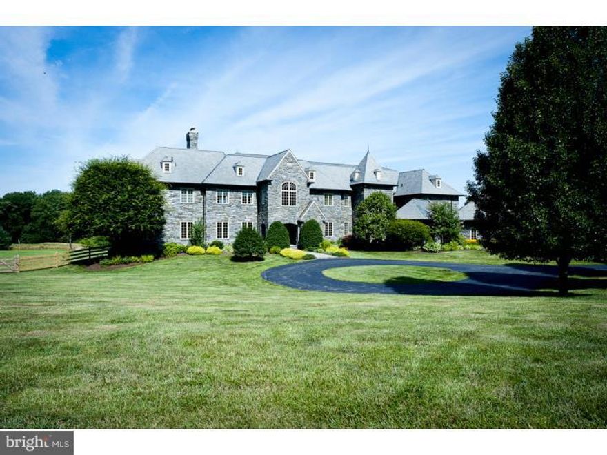 "Conamara"...... appropriately named after and referred to "as the real emerald of Ireland"..this land for all seasons, has an idyllic setting of gently rolling hills with incredible views of wildflowers, sunrises and the most magnificent sunsets on the Main Line!! This exquisite stone Normandy home on the original Ardossan Estate in Radnor Township, graciously sits on 9.9 magnificent acres and although young in age features many of the classic details found in much older estate like properties. As you enter through the pillars one experiences not only feeling of grandeur, but of privacy and serenity while the circular driveway and courtyard provide you with a welcoming feeling. The attention to detail is unparalled in the 15,000 +/- sq.ft masterpiece that was designed to capture the stunning views from every room,and features the finest in elaborate stonework, custom millwork, 10 ft. ceilings, sweeping staircases, stone fireplaces and a floor to ceiling mahogany Library/Office. The Lower Level is the ultimate entertaining dream with Bar, Billiard Room, Wine Cellar, In home Movie Theatre, and Exercise Room. The Master Suite exudes grace with a stone fireplace, luxurious  Master Bath, walk-in closet and Sitting Room. All of the secondary Bedrooms have their own private Baths and convenient Laundry Rooms can be found on the first and second floors. This magical estate is completed with a beautiful reflection Pool/Hot Tub, Tennis Court and outside Sunroom that capture the picturesque landscape. A true beauty in every sense of the word is awaiting the next discriminating buyer who has an appreciation for the finer things in life and is seeking a setting that will take your breath away!!