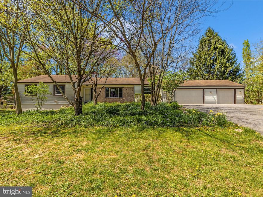 Here it is!!  Renovated rambler on almost 1 acre backing to trees.  Wonderful main level living features a brand new kitchen, with new cabinets, and new appliances.  3 car garage enters into a laundry room/mud room which enters into the new kitchen.  There is a family room with fireplace off the kitchen and new sliding door onto a wonderful screened porch overlooking the huge yard.   The main level living room and separate dining room have hardwood floors. 3 main level bedrooms with hardwood floors, and 2 full baths.  The primary bathroom has a large  level tiled shower.  Lets go downstairs: The newly finished lower level features a large 2nd family room & living room with level walkout, 2 bedrooms, a full bath and a rough in for a sink which could possibly be a kitchenette. Brand new carpet.  Need an in-law area this could be it!    No HOA and great commuter location.  Good as new, with a big yard and NO HOA.  3 car garage and easy commute to Rt. 270 and major highways.