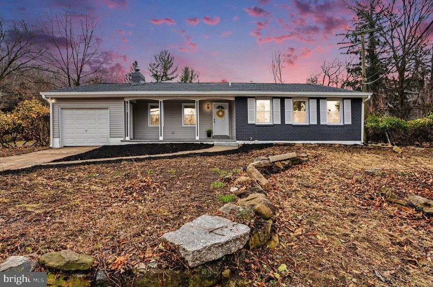 This charming ranch-style home in the desirable Riderwood community of Towson and nestled up to Ruxton, offers the perfect blend of comfort and modern living. Fully renovated in 2026, this beautifully updated residence is in pristine condition and features three spacious bedrooms and three full bathrooms, thoughtfully designed for both everyday living and entertaining.

Don’t let the square footage fool you — this home lives much larger than it appears. The layout is exceptionally thoughtful, creating a spacious and open feel throughout the main level. All three bedrooms and two full bathrooms are conveniently located on the main floor, offering true one-level living. The primary bedroom serves as a peaceful retreat, complete with its own private ensuite bathroom, offering comfort, privacy, and convenience.

The heart of the home is the inviting kitchen, showcasing stainless steel appliances, brand-new cabinetry, expansive countertops, and a welcoming breakfast bar — ideal for casual mornings or gathering with friends and family. The open flow continues into the living room, where a cozy wood-burning fireplace with a classic mantle anchors the space. A stylish accent wall provides the perfect backdrop for your artwork, photos, or personal design touches, making the space feel both warm and uniquely yours.

Sliders just off the kitchen lead to a paved patio, creating a seamless indoor-outdoor connection that’s perfect for entertaining or enjoying a quiet evening outside. The backyard offers a wonderful canvas for a unique landscaping design, garden beds, or a personalized outdoor retreat tailored to your vision.

A spacious front porch welcomes you home and provides a charming place to relax with your morning coffee. It conveniently connects to the attached garage — perfect for avoiding those rainy days — while the ample driveway space offers plenty of additional parking for guests.

Major system upgrades provide peace of mind and true turnkey living, including a brand-new roof and gutters, new HVAC system, new water heater, upgraded electrical, freshly cleaned fireplace, new paint, new carpet, and updated light fixtures throughout. It truly feels like new construction — without the wait.

The fully finished basement beautifully expands the living space. It features a spacious family room, two additional finished rooms perfect for a home office, gym, or guest space, and a fully finished bathroom — offering flexibility for multi-generational living, remote work, or extended stays.

Beyond the home itself, the location offers exceptional convenience. Just minutes from Towson University and Goucher College, as well as premier medical facilities including St. Joseph Medical Center and Greater Baltimore Medical Center, this property places you close to top-tier education, healthcare, shopping, dining, and everyday amenities. Commuter routes are easily accessible, making travel throughout the Baltimore region seamless.

Natural light fills the home, highlighting the fresh finishes and quality craftsmanship throughout. Every detail has been thoughtfully updated to blend comfort with contemporary style.

This home is more than just a property — it’s a place where lasting memories are made. Experience the warmth, charm, modern upgrades, and unbeatable convenience that Riderwood living has to offer.