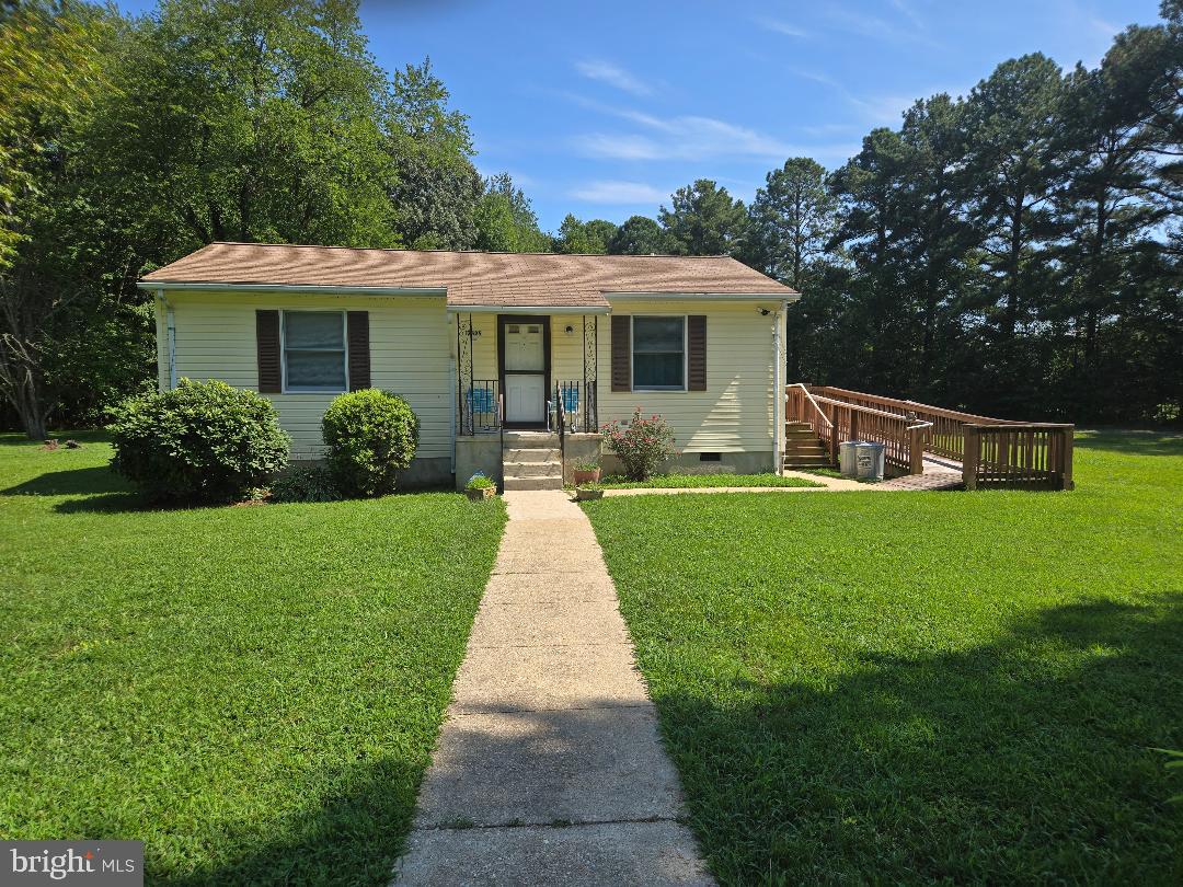 Charming 2-bedroom, 1-bath home on 3 private acres. Features a handicap-accessible ramp, single-level living, and a functional layout with a bright kitchen and cozy living space. Enjoy the peace of country living with plenty of room for gardening, recreation, or future expansion. A perfect blend of comfort, space, and accessibility.