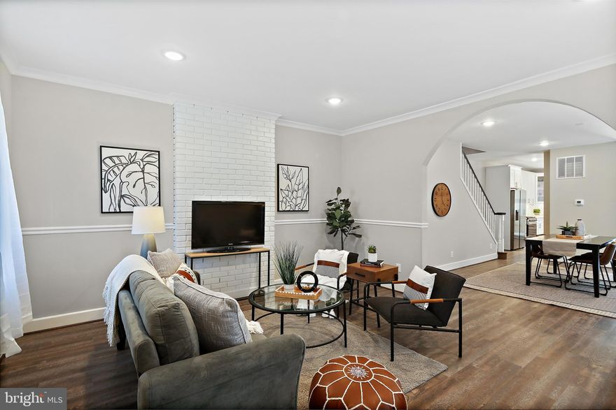 PRICE DECREASE!!! VERY MOTIVATED SELLER!! A Must See with Over 2300 SQFT Of Completely Renovated Living Space in HISTORIC WOODBERRY!!!! This Stunning 4 Bedroom 3 Full Bath Home Features An Open Concept Layout With Luxury Vinyl Flooring Throughout Accented With A Neutral Color Palette, And Recessed Lighting ; Eat In Kitchen Offers Quartz Countertops With A Huge Island With Tons Of Storage Space , Brand New Custom Cabinetry ,Stylish Pendent Lights , And Stainless Steel Appliances ; Sliding Glass Doors Take You Outside To A Large Deck, Perfect for Entertaining Relaxing With Your Morning Cup Of Coffee, Or Just Watching The Sunset ; A Spacious Full Bath Concludes On The Main Level: Travel Upstairs To Find A Large Hallway Leading To Your Spacious Master Bedroom With A Luxury Full Bathroom ; As You Walk Down The Hall Way Two More Spacious Bedrooms And A Gorgeous Huge Full Bath Complete The Upstairs; Lower Level Has Luxury Vinyl Flooring , Recessed Lighting And A Side Entrance /Exit. Everything In This Beautiful Home Is BRAND NEW ; HVAC , Plumbing , Electric , Cabinetry, Appliances ,Flooring ,Paint ,Lighting ,Bathrooms , And Much More. Most Of All, Enjoy The Amazing Location ! Tons Of Great Restaurants Just Around The Corner , Close To All Major Highways , Shopping , Parks , Public Transportation And Much More