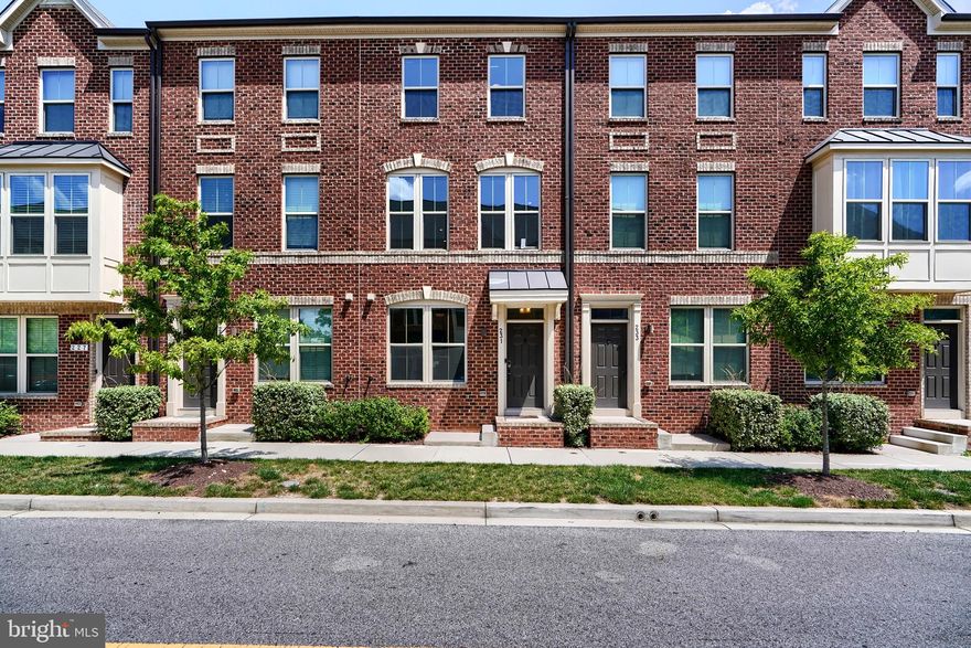 Welcome to 231 S Macon Street!  Newer construction built in 2020 in Oldham Crossing.  Enter from rear garage or front greeted by a first floor bedroom and full bathroom.  Carpeted stairs will take you to open layout on second floor with central kitchen opening into a generous living room on one side and the dining area on the other.   Large windows offer plenty of natural light to come into the home.  Off of the dining area is conveniently located half bath.   The rear  deck has a privacy barrier from neighbor and as a bonus comes with a motorized awning with remote control.  Kitchen has stainless steel appliances with large center island and plenty of cabinet space.  On the third floor you will find a fabulous master suite with large bath supplied with double vanity for convenience.  Third bedroom with en suite bathroom is located also on the third floor.  Laundry is located in hall way in the third floor making it easier to access from primary and secondary bedrooms.   Call your agent to schedule a showing soon!