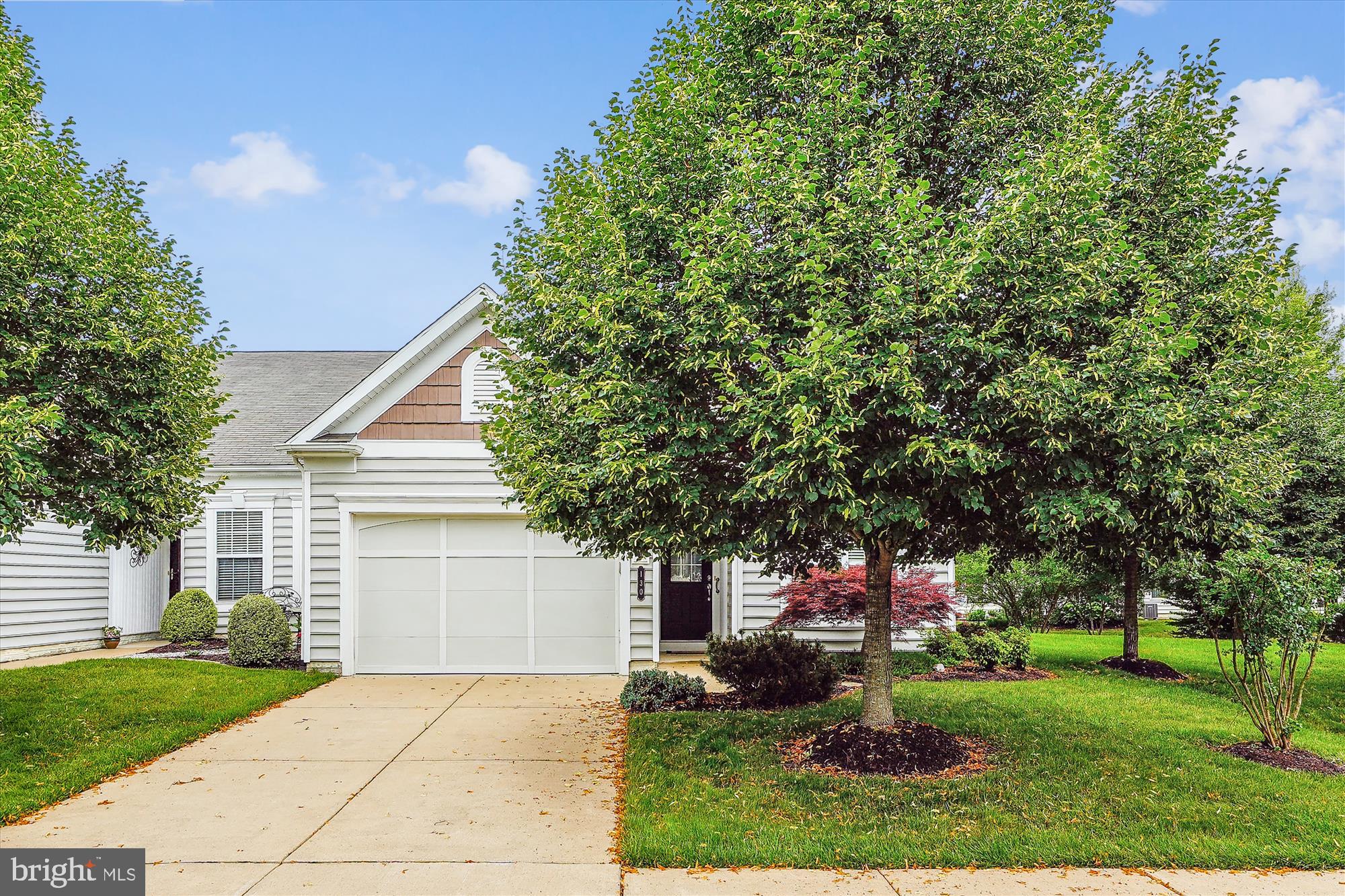 Welcome to the fantastic property at Celebrate Virginia North! This vibrant community offers an array of amenities, including both indoor and outdoor pools, tennis courts, and much more. The home features two bedrooms with brand new carpet, and the primary bedroom boasts a full bath with double doors and a spacious walk-in closet. The kitchen is equipped with elegant granite countertops, double sinks, and recessed lighting. Throughout the home, you'll find four ceiling fans for added comfort, along with a separate laundry room. The property includes a one-car garage and driveway parking. The cozy living room opens up to a lovely deck, perfect for relaxing or entertaining. Conveniently located near shops, stores, and just minutes from I-95 North and South. Seller has a one year warranty that is transferable to new buyer.