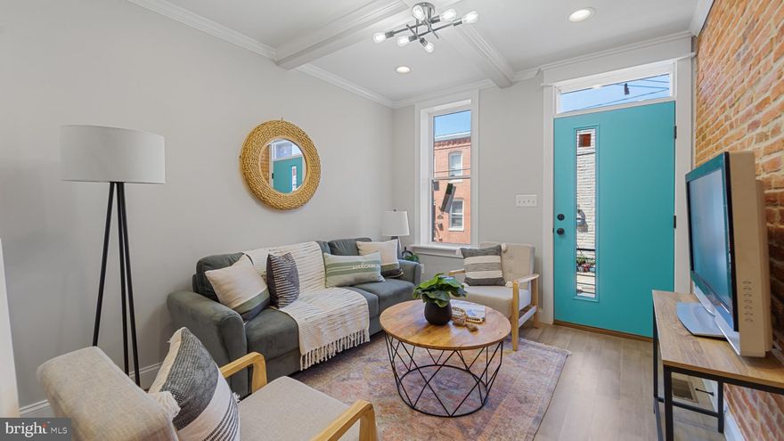 BRAND NEW RENOVATION LOCATED IN THE HEART OF LOCUST POINT. LVP FLOORING CASCADES THROUGHOUT. ENJOY CUSTOM TWO TONE WHITE & GRAY CABINETRY, UPGRADED TRIM AND PAINT PACKAGE, IMPORTED TILE, QUARTZ COUNTERTOPS, HIGH END APPLIANCE PACKAGE WITH BEVERAGE CENTER IN DESIGNER GALLEY CHEF'S KITCHEN. TONS OF NATURAL LIGHT. FINISHED LOWER LEVEL. HIGH CEILINGS. WHOLE HOUSE AUDIO. TONS OF STORAGE. EXPOSED BRICK. WALK-IN SHOWERS. WALK-IN CLOSETS. SPACIOUS 3 BEDROOMS WITH 3 FULL BATHROOMS. PRIVATE PATIO WITH FENCED IN YARD. EXPANSIVE TWO TIER ROOF DECK - GREAT FOR ENTERTAINING. CLOSE PROXIMITY TO RETAIL SHOPPING, LOCAL DINING, DOWNTOWN, STADIUMS, UNDER ARMOUR, AND ALL MAJOR HIGHWAYS. SCHEDULE A PRIVATE TOUR TODAY!