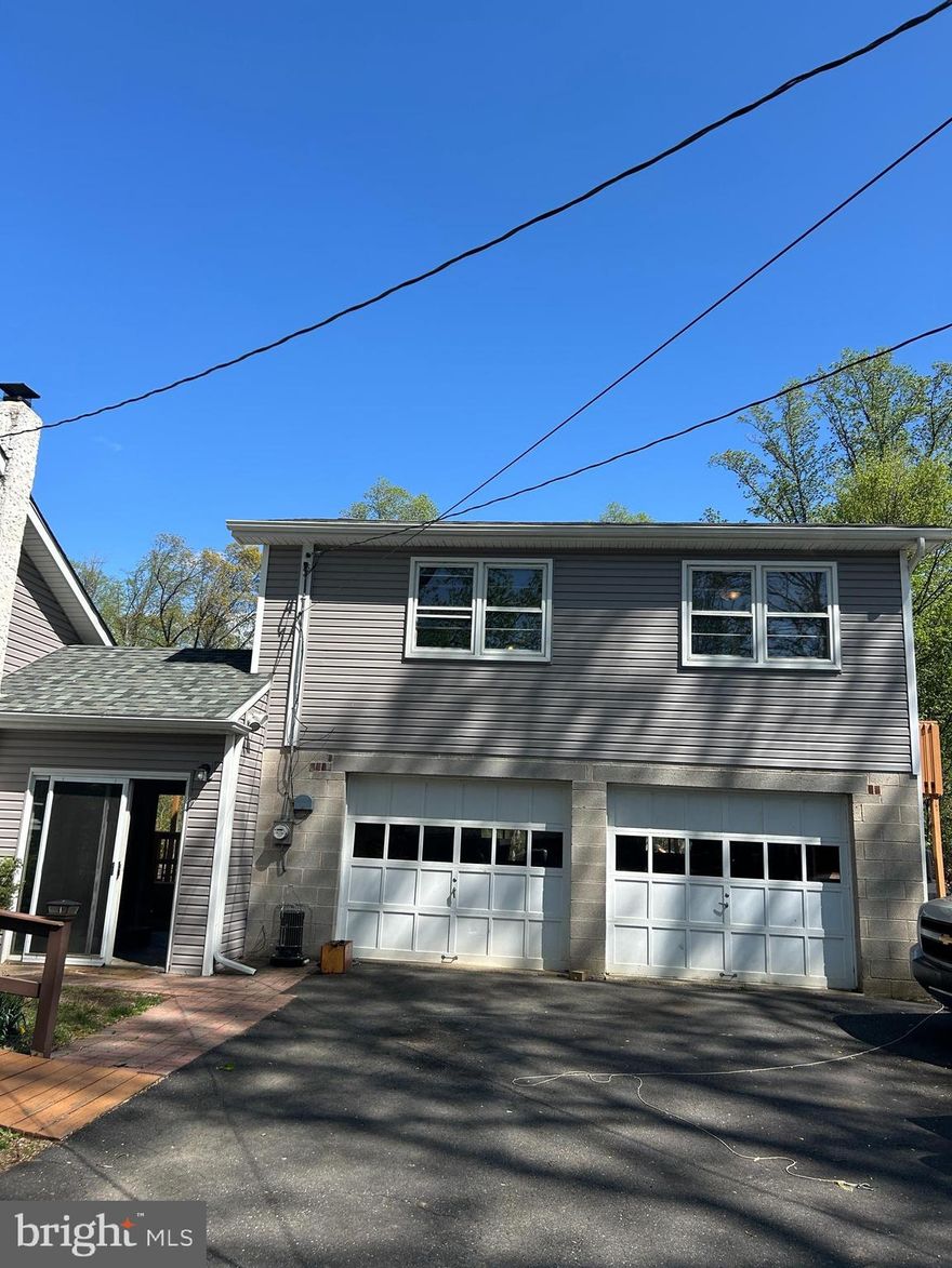 This quaint 1 bedroom, 1 bathroom apartment in Springfield Twp., Bucks County, Pa has been recently painted and had new flooring installed last week.  The 11' x 13' Livingroom is located off of the kitchen and is wired for surround sound.  The apartment square footage is deceiving as the space is very comfortable and  more spacious than you would think.  The 2 car garage below the apartment is included with the rent.  Tenants have shared use of the yard, driveway parking and normal trash pick up with the tenants in the main house (Bulk trash pick up is NOT included.)  The laundry for the apartment is located in the garage.  The owners may allow one dog at their discretion.  Great location...close to Route 78, Route 309 and the Turnpike!