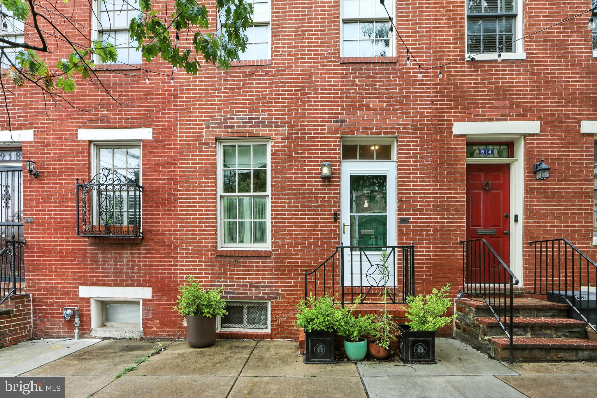 Welcome to 916 William Street, a beautifully maintained home located in the heart of Baltimore’s historic Federal Hill district. This home offers the perfect balance of peaceful living and unbeatable convenience.
Step inside to a wide open living space featuring beautiful hardwood floors, classic marble accents, and plenty of room to entertain, work from home, or simply relax. With multiple living areas across four levels, you’ll have the flexibility to create spaces that truly suit your lifestyle. The top level offers a private en suite—ideal for a primary retreat, guest suite, or dedicated office space.
Enjoy two private outdoor areas—perfect for hosting friends, gardening, or unwinding with your morning coffee.
The home also features a finished basement that adds even more flexible living space, along with nearly new appliances throughout, making everyday living both stylish and functional.
Parking is easy with permitted street parking and the option to lease a space in a nearby garage—transferable to the new owner for added convenience.
Just a short walk to the Inner Harbor, parks, schools, restaurants, and local hotspots, this home places you right in the center of everything, yet still feels tucked away from the hustle and bustle.
Don’t miss your chance to own this move-in-ready gem in one of Baltimore’s most desirable neighborhoods!