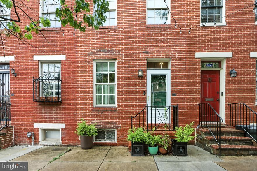 Welcome to 916 William Street, a beautifully maintained home located in the heart of Baltimore’s historic Federal Hill district. This home offers the perfect balance of peaceful living and unbeatable convenience.

Step inside to a wide open living space featuring beautiful hardwood floors, classic marble accents, and plenty of room to entertain, work from home, or simply relax. With multiple living areas across four levels, you’ll have the flexibility to create spaces that truly suit your lifestyle. The top level offers a private en suite—ideal for a primary retreat, guest suite, or dedicated office space.

Enjoy two private outdoor areas—perfect for hosting friends, gardening, or unwinding with your morning coffee.

The home also features a finished basement that adds even more flexible living space, along with nearly new appliances throughout, making everyday living both stylish and functional.

Parking is easy with permitted street parking and the option to lease a space in a nearby garage—transferable to the new owner for added convenience.

Just a short walk to the Inner Harbor, parks, schools, restaurants, and local hotspots, this home places you right in the center of everything, yet still feels tucked away from the hustle and bustle.

Don’t miss your chance to own this move-in-ready gem in one of Baltimore’s most desirable neighborhoods!