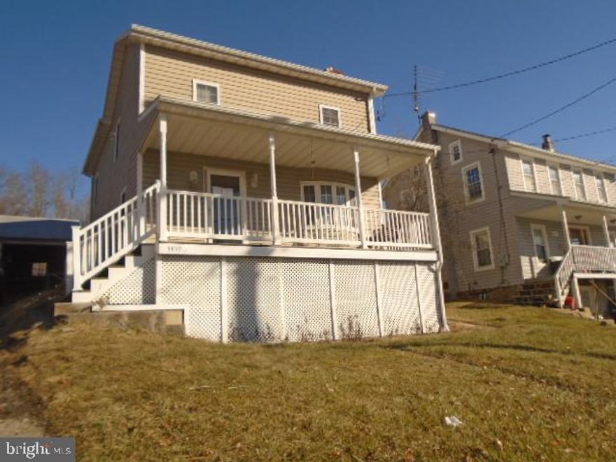 Nice size Home situated on .44 acres. Huge covered front porch and rear patio. Home has been renovated in the past to include kitchen, baths, windows and more !! Main level has spacious living room. Country kitchen has lots of cabinet space. French doors off rear leads to patio and fenced rear yard. Upper level Has 3 generous size bedrooms and 2 full baths.  Minutes  to Union Mills Park and  Charles Carroll Elementary School.  Agents please see documents on this listing and agent remarks for contract details.