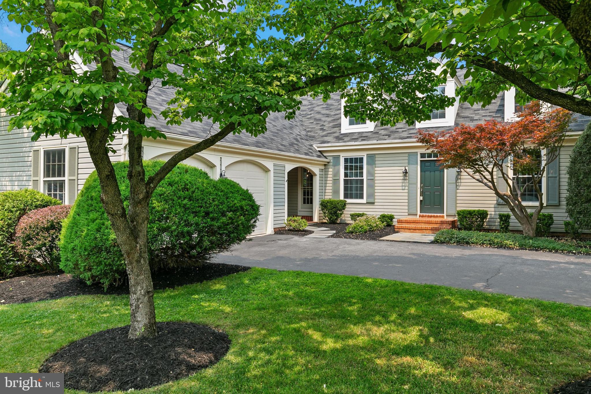 Experience timeless elegance in this Colonial Williamsburg-style home, nestled in the serene North Potomac community. Don't let the exterior deceive you, this home is much larger than it appears. This classic abode is modernized for today's lifestyle. Meticulously maintained and renovated - nothing was spared! Sundrenched on all floors. Fully renovated kitchen includes cabinetry, stainless steel appliances, quartz countertops, large island, recessed, and decorative lighting. Open concept family room with fireplace off the kitchen. Formal living and dining room leading to the walk around deck - perfect for summer sunsets and entertaining. First floor owner's suite features 2 closets and a renovated bathroom with free-standing soaking tub, double vanities, defogging mirror, heated towel rack, and walk-in shower. Laundry, pantry, and powder room complete the first floor living. Upper level has 3 generously-sized bedrooms and a renovated hall bath with double vanities and linen closet. Lower level includes a 5th bedroom with full bathroom, office space, large storage room, and bonus room with recessed lighting and walkout access to the rear yard. Freshly painted. New carpet (2023). Hardwood floors. Water heater (2020). Updated windows and efficient multi-stage HVAC system. Exterior landscaping includes shrubs and newly planted trees (2020). 2 car garage with convenient breezeway to the home's kitchen side door. Community pool, tennis court, new tots lot, and trail access to Muddy Branch Park. Enjoy convenient public transportation options and easy access to major routes. Located within the top-rated Wootton, Frost, Travilah school district. This residence marries charm, comfort, and convenience - truly a place to call home.