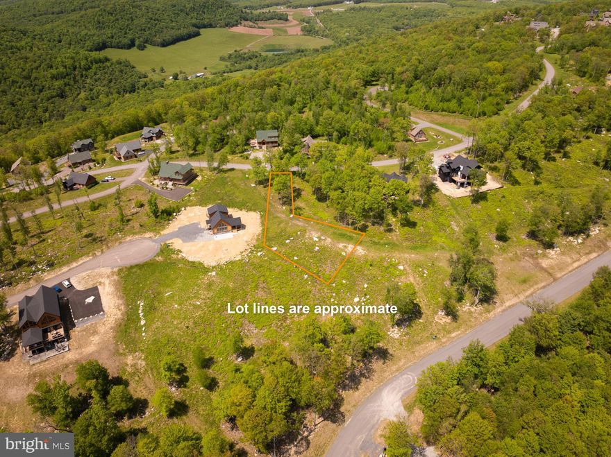 If you are looking for a great homesite located in the heart of Deep Creek Lake, this is it! This property is located in the beautiful mountaintop community of North Camp. With .52-acres, you can build just about any size home you desire. You are just a short drive to Wisp ski slopes and whitewater course. Offering public water and sewer, the possibilities are endless to build your dream home. Adjacent lot can also be purchased, which would give you double the space.