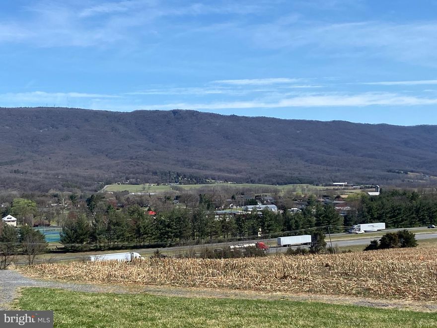 The Sellers have 3 beautiful lots for sale on this hill top.  Great mountain views, public water available, road frontage and 4 bedroom conventional septic percs.  Close to the historic town of New Market, the North Fork of the Shenandoah River, and the New Market Battlefield with it's iconic museum and restored farmstead.  Excellent home sites for you to build and experience the peace and beauty of this historic area.   Located in a rural agricultural setting yet close to town and only 23 minutes from the city of Harrisonburg; home of James Madison University and all that a college town has to offer.  Bring your dreams and your building plans and take a walk.  These lots are mostly open field but all back to woods.    $8,000 water tap fee if you want to tap in to the New Market town water line.  There is a fire hydrant along the right of way to the water tower that may reduce your home owners insurance cost.