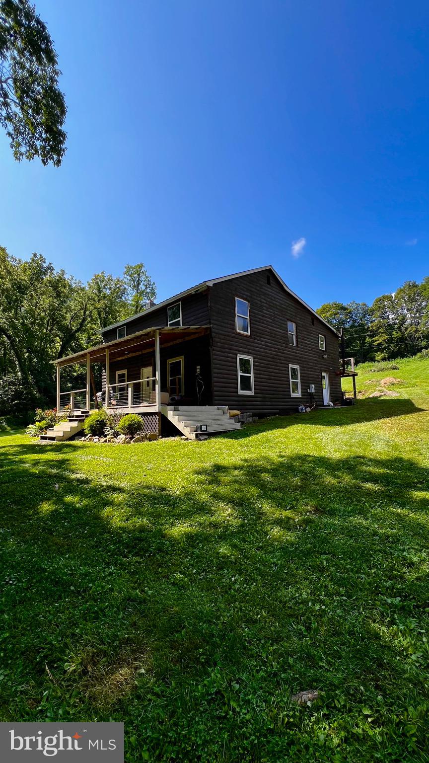 MORE PHOTOS COMING SOON — Tucked away on 10 private, unrestricted acres, this 1940s farmhouse offers the perfect mix of seclusion and potential. The home features 3 bedrooms, 2 bathroom, a private septic system, and a natural spring water source. Metal roof and windows were updated in 2021.
The land is a true outdoorsman’s dream—hiking trails, ATV paths, and multiple potential building sites throughout. Whether you’re looking to finish the existing home or bring your own plans to build new, the options here are wide open. High-speed fiber optic internet is available.
Don’t miss this chance to create your own mountaintop retreat in Wild and Wonderful West Virginia.
