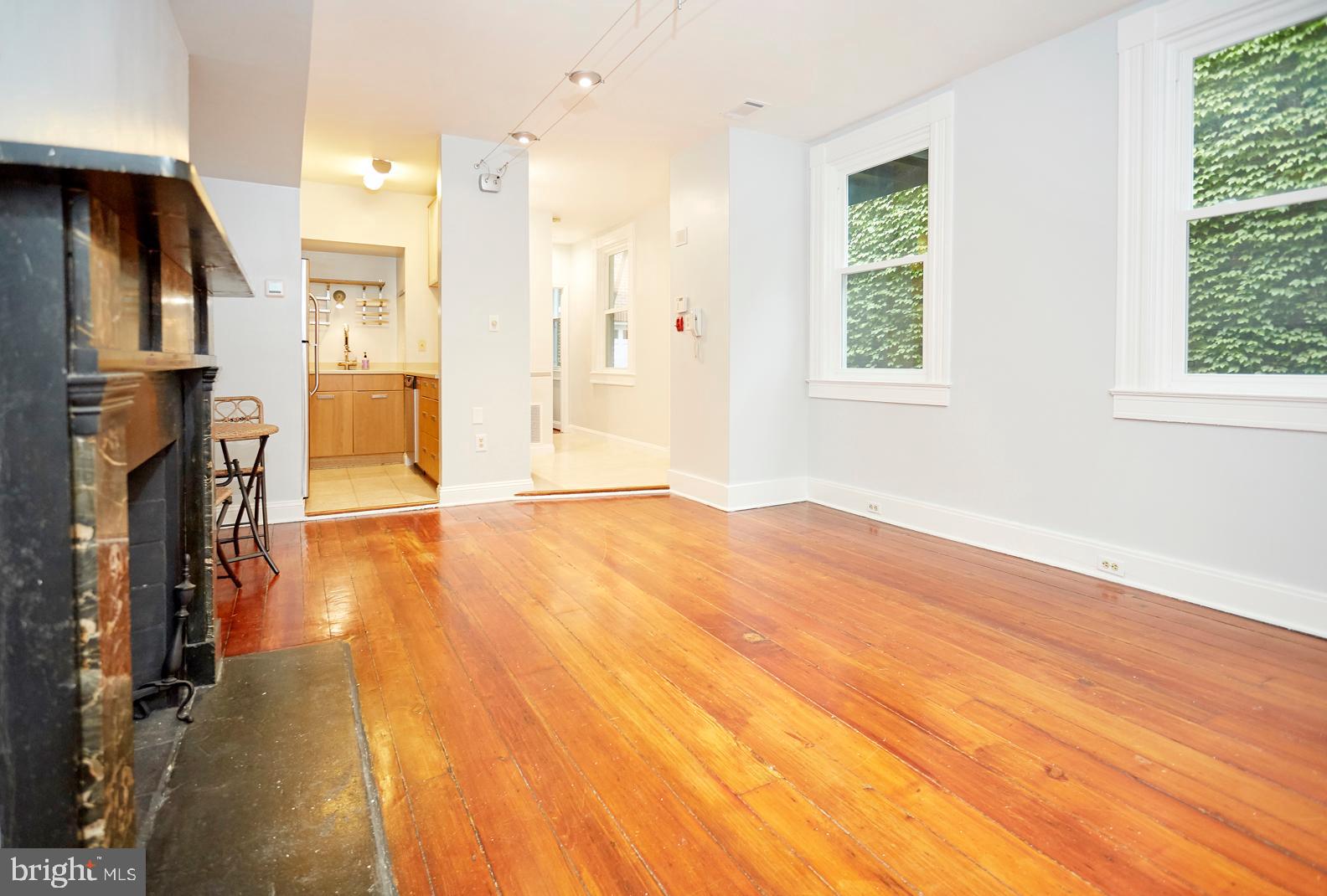 Assumable VA loan currently at 3.25% with M&T Bank. Save your clients thousands by beating the market rates.
Lovely historic building in the heart of Baltimore's Mount Vernon neighborhood. This is Charm City's premier community for Maryland history and culture! The home's living room features historic wide plank flooring, curved plaster wall, and a classic stone fireplace. There's stainless steel appliances and finishes in the well laid out kitchen. Abundant counter top space and seating for bar stools makes the dining area very functional. Stackable washer/dryer unit conveniently located in the updated full bathroom. The two rooms in the rear of the condo could be used as bedrooms, or split between a bedroom/den/office.
Condo fees are low compared to other nearby units! The unit is accessed through a lovely gated courtyard. Just 1 block north of all the dining options in Mount Vernon Marketplace. 3 blocks west of all the lovely parks around the Washington Monument. There's so much more to see and explore in beautiful Mount Vernon, Baltimore!