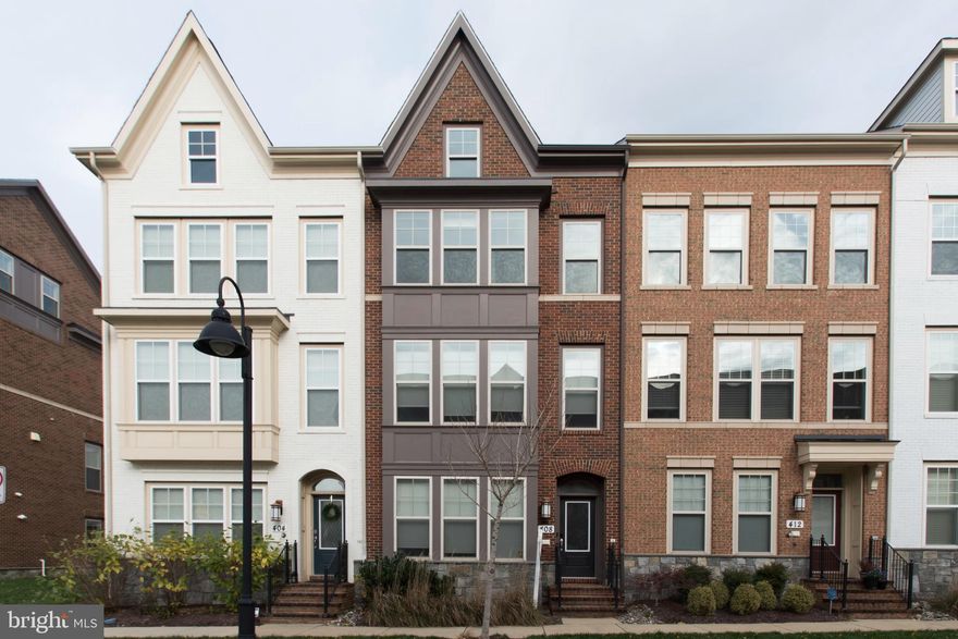 Step right into luxury living at Crown Farm! This stunning 4-level townhome offers 2,308 sq. ft. of high-end finishes and prime location just a few blocks from all the shops and restaurants Crown has to offer. The entry level features a 2-car garage with Tesla charger and a spacious bedroom and full bath. The main level boasts a kitchen with stainless steel appliances, granite countertops, and a beautiful island, open to the dining and living areas. A half bath and small deck complete this level. Upstairs, enjoy the convenience of front loading washer/dryer and a master bath with dual sinks and shower heads. The walk-in closet in the primary bedroom has built-in drawers, shelfs, and racks.  The huge 4th level/bonus room boasts a large semi-private rooftop balcony. Wood floors throughout except in the bedrooms and bonus room. Community amenities include tennis courts, pool, exercise room, playground, and party room. Take advantage of the shuttle bus to the Metro Station. Apply online with a $55/adult application fee. Don't miss this fantastic opportunity!