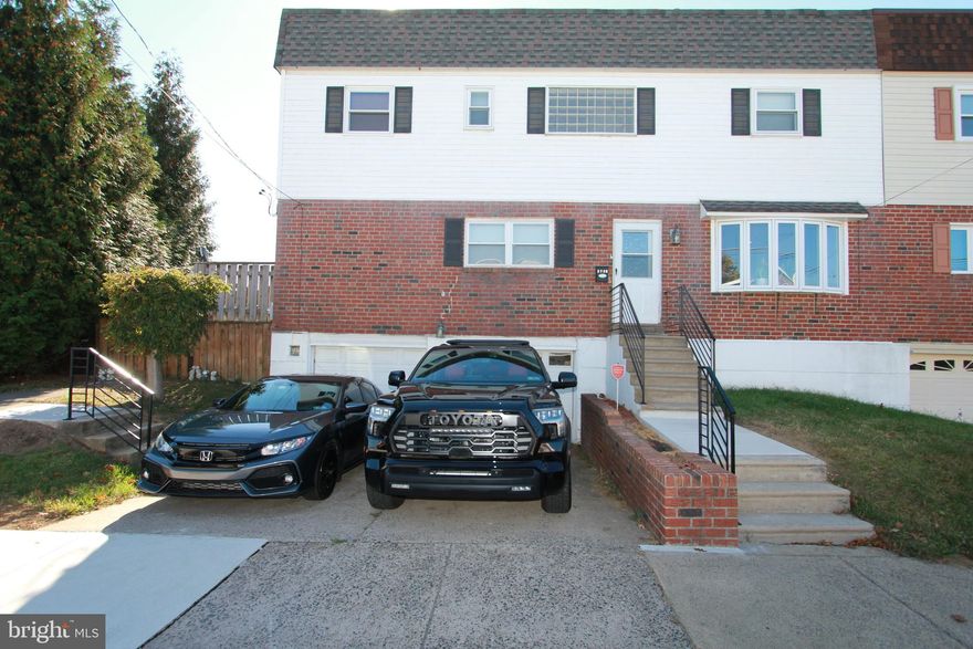 Welcome to 2738 Axe Factory Rd. This unique corner twin home features luxury, comfort and convenience. Featuring 3beds and 2 ½ bath. Open floor plan with updated hardwood flooring, custom built/designed picture frame wall with an undermount functional electric fireplace. The open floor plan flows into the dining room and into a spectacular gourmet kitchen island that can accommodate 5-6 seating. Updates in this kitchen include: Carrera design floor tiles; 36” stainless steel range with an over-the-top exhaust fan. Modernized kitchen cabinetry with Level 5 quartz countertop. Updated appliances (dishwasher, refrigerator, slide out microwave). No expenses spared in this kitchen upgrade. Other amenities in this property include: HVAC central Air/Heat; 75-Gallon hot water tank; recess lighting; ceiling fans throughout; updated carpeting in bedrooms. Master bedroom featuring double closet, double glass French door leading into a large master bath featuring a jacuzzi tub, modernized tiled bath and wainscoting designed walls. Finished basement with built in bar, pellet stove, separate laundry room and walkout entrance to a double Two-car garage (Car lovers dream). Lower level provides walkout access to (larger than usual) rear yard featuring a custom brick barbecue grill, pergola, tiki bar and swing set for children. Located within walking distance to Winchester Park and Pennypack Park, this property combines suburban tranquility with city convenience – close to all major amenities and without the suburban traffic. Come and enjoy all that Northeast Philadelphia has to offer. Call to schedule your private showing today!!!!