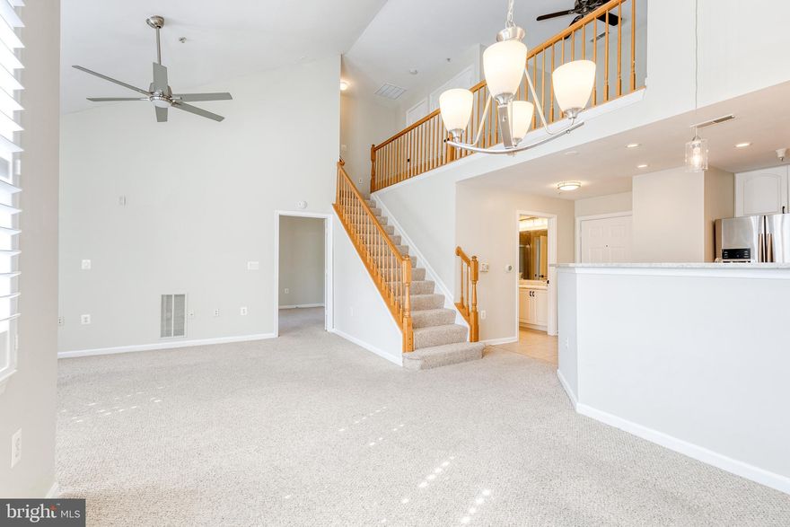 RARELY available Loft Unit in the Gem of Hunt Valley; High View! Enter into this meticulously maintained loft residence, with multiple upgrades throughout. One's eye finds the updated kitchen as soon as you open the door, featuring granite countertops, newer stainless steel appliances, a deep custom sink, and luxurious backsplash. Vaulted ceilings add gravitas in the dining room and living room, both flooded with light from the courtyard outside. The living room's fireplace is perfect for upcoming fall and winter nights, while the deck is primed for fall evenings watching the sunset. The primary bedroom has a sizable walk-in closet and remodeled attached primary bathroom. Modern tile, quartz countertops on the double vanity, and fresh complementary fixtures & hardware are spotless and ready for your toothbrush. The best part of Residence 516 is the loft space with a massive storage space. Perfect for a second bedroom, office, workout space, or flex room. High View at Hunt Valley has resort style living with pool, clubhouse, fitness center, and more. Don’t miss your opportunity to move into Residence 516 and experience all the the gem of Hunt Valley has to offer!