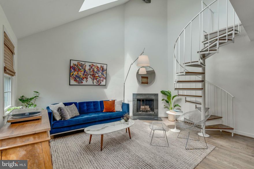 Welcome to 2232 Washington Ave #W-201 - a one-of-a-kind, two-bedroom loft condo abundant in style and comfort.

Functional and gorgeous, the completely renovated kitchen has solid wood cabinetry, sleek porcelain floors, and quartz countertops. Spill something on your chef's coat while cooking? Toss it in the brand new in-unit washer and dryer!

The living and dining area is a showstopper from top to bottom. Hardwood floors, a wood burning fireplace, a cathedral ceiling, skylights, and exposed beams create an airy and open space that’s perfect for both entertaining and cozy nights in. 

Upstairs, the loft bedroom boasts a luxurious wool carpet, a custom shaded skylight, and a walk-in closet. The downstairs bedroom features hardwood floors and Elfa shelving in the large closet. Need more storage? No problem—there’s a crawl space to tuck away all your extra treasures.

The stunning bathroom was completely redone in 2020, and features a custom soapstone vanity, glass shower, and heated slate floors. 

This home is within walking distance of the community pool, The Daily Dish restaurant, Rock Creek Sports Club, and The Parkway Deli, featuring its famous pickle bar. The DC line is also steps away. Parking and the J1 and J2 bus lines make commuting a breeze. 

Book an appointment or stop by an open house to see this beauty in person!