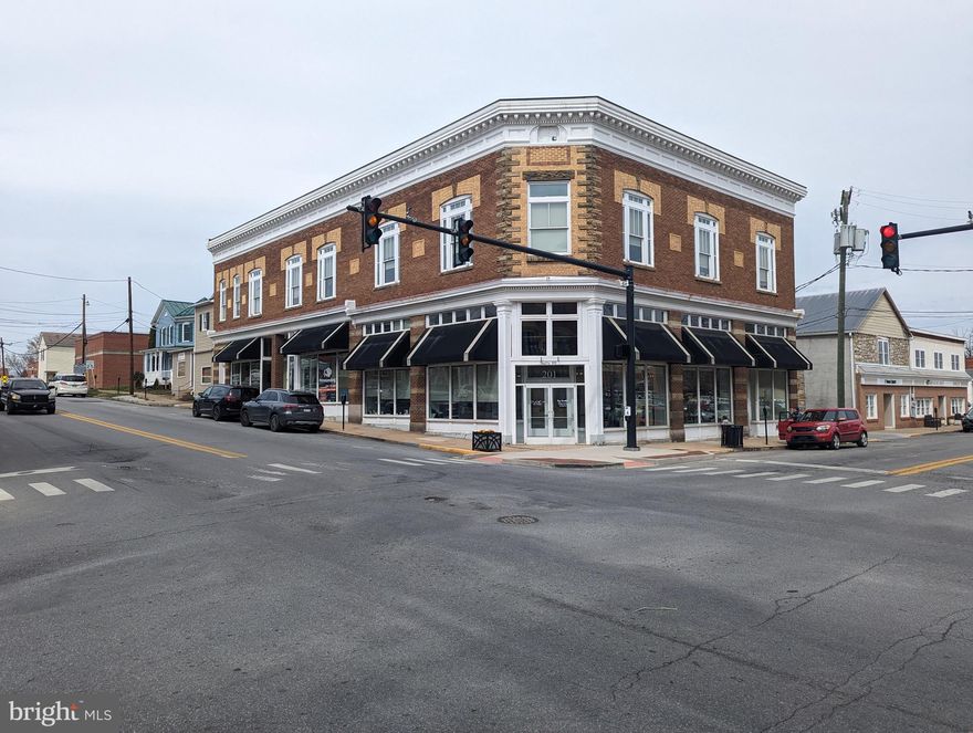 Updated Fully Leased multi-tenant commercial building in historic downtown Charles Town, WV.  Building sits adjacent to the Jefferson County Judicial Buildings, Old Opera House, United Bank, City Municipal Parking lot, and several professional firms including law, lending, and Real Estate.  Minimal common area obligations for the property owner.  Building offers elevator and small lobby, fire monitoring, sprinkler system, and key fob electronic entry.  Historic details abound- dental moulding, mosaic tile, tin ceilings, wood floors. This Is the stabilized, turn-key property you've been looking for. Current professional property management in place.  Located in Federal Opportunity Zone. financials available.