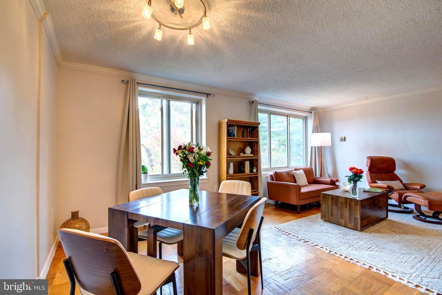 Discover your bright, top-floor escape in the heart of Lyon Village—where walkability, convenience, and smart living meet. This sun-filled condo offers the perfect blend of style and function, with fresh neutral paint, great natural light, and a layout that feels instantly livable. The updated galley kitchen features granite counters, modern appliances, and a clean design that works whether you're meal-prepping, hosting friends, or grabbing coffee on the go. The oversized bedroom easily fits a California king with room for a desk, dresser, or reading nook—because real life needs real space. The bathroom feels fresh and spa-inspired, with timeless finishes you won't have to "fix later."

Life here is simple and streamlined: the condo fee covers all utilities except internet and cable, so you get one predictable monthly payment without the juggling act of separate bills. The community offers everything you need right on-site, including a pool, fitness center, picnic space, club room, secure bike storage, laundry facilities, on-site management, and resident parking.

The location seals the deal. You're just minutes from D.C., the Pentagon, and Amazon HQ2 with effortless access to Route 66, the GW Parkway, and the Courthouse & Clarendon Metro stations are less than a mile away. Arlington County's ART Bus #55 stops right across the street for even more transit flexibility. Whether you walk, bike, Metro, or rideshare, commuting is easy and adaptable.

Everyday essentials are just as close. MOM's Organic Market and Whole Foods are both within half a mile—with Tatte Bakery right across from Whole Foods for your weekend pastry fix. The Lyon Village Shopping Center across the street offers Starbucks, The Italian Store, restaurants, and CVS. Head to Clarendon and you'll find Trader Joe's and Pacer's Running near the Metro. Sprouts Farmers Market will join the neighborhood in 2026, adding even more options.

Outdoor lovers and active residents will appreciate Lyon Park, the Custis Trail, shaded green spaces throughout the community, Arlington County's Central Library, and one of the county's signature lap pools—all a short walk away. The building is pet-friendly too, allowing up to two cats and service dogs.

Whether you're a first-time buyer looking to ditch rent, a city lover seeking a turnkey space, or an investor focused on location and value, this condo delivers top-floor privacy, move-in-ready comfort, and a walkable lifestyle that's hard to beat. City living—simplified.