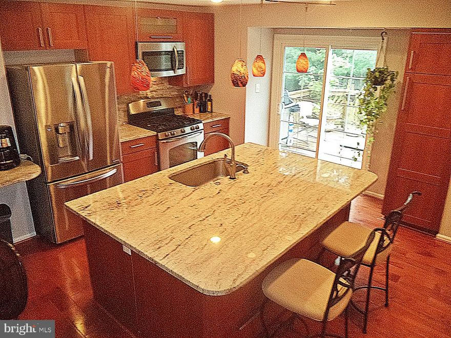 WOW !JERRY EARNS CONTRACT in ONE DAY !JERRY's 325th home SOLD* ! CALL JERRY to LIST & SELL ! / HURRY ! Open-Concept, Light-Filled Custom-modified HOME gushes SUN ALL DAY ! RICH Cinnamon-Maple HARDWOODS*GORGEOUS GRANITES*Custom-GOURMET KITCHEN Continent...(not Island) Stainless-Steel & GAS-Convection Oven*French-Dr FRIDGE*Pantry*Specialty Lighting* Pleases the CHEF*4BR & 2FB+2HB*  SUNKEN Living-Room* 2-Story Foyer* Master-Suite TALL Cathedral Ceilings/WIC/Dual GRANITE sinks/Jet-Tub/Sky-Lite*Lower-Level Walk-Out*Huge DECK to Trees & Community-Open-Space*Short Steps to Black Hills Regional Park & Lakes*Main-Lvl Laundry*Close-by-BUS*Near Shops/Theatre/Restaurants/Wegmans/Harris Teeter/Giant/Safeway*TWO Community Pools/Tennis/Tot-Lots*RUN Don't Walk !