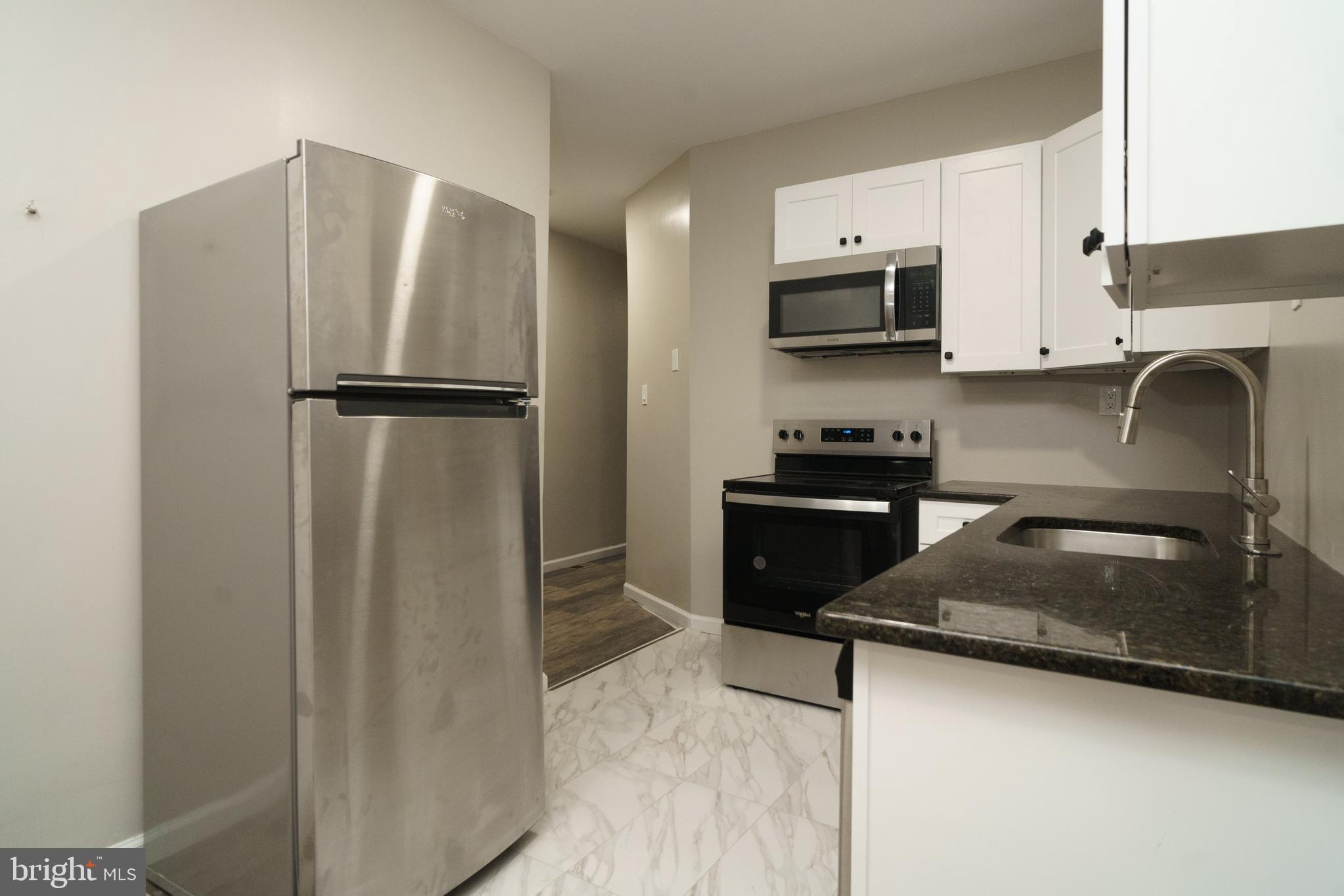 Introducing 5820 Willows Ave, this brand new gut renovated apartment is located in the Kingsessing neighborhood of Southwest Philadelphia. Upon entering, you will immediately notice the attention to detail that defines each apartment. The first and second floor apartments offers an open floor plan seamlessly connecting the living area, kitchen, and dining spaces, creating a warm and inviting atmosphere. The unit also boasts a nice central hallway, which branches off to both bedrooms and the bathroom. The living and kitchen area and offers an open floor plan with classy hardwood flooring. The kitchen features sleek granite countertops, all-wood cabinets, stainless steel appliances and ample cabinet space. This brand new has its own private Washer Dryer in basement as well as its own private backyard It's the perfect space for cooking up your favorite meals and entertaining guests. This unit is equipped with central air as well Tenants are responsible for electric and water. Pets are welcome case by case. Schedule your showing now!
