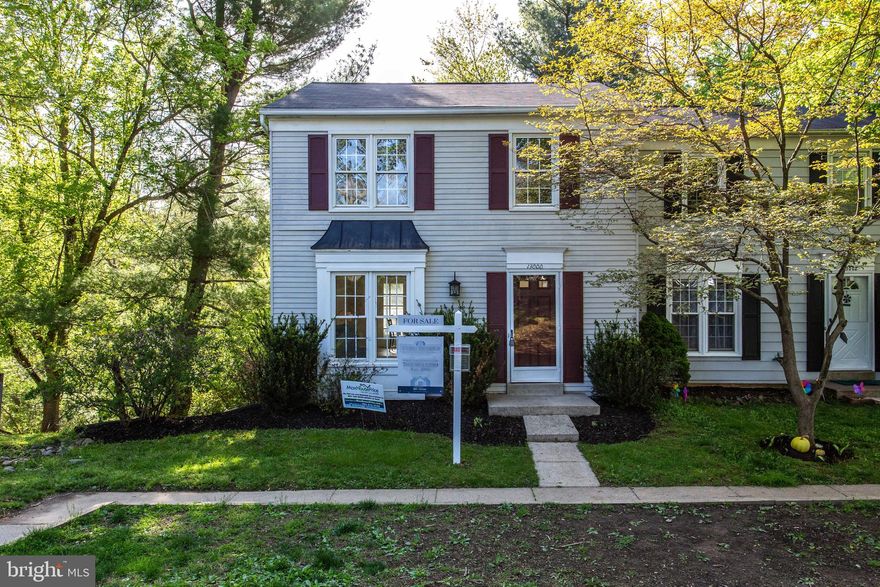 Move-In Ready! Remodeled 3BR, 1.5BA end unit townhouse with one assigned parking space located on quiet cul-de sac in sought after Pleasant Fields. Upgraded kitchen and baths, new carpet, and fresh paint throughout. Professional landscaped yard offers excellent curb appeal to welcome your guests. Living room will accommodate large family gatherings. Dining/kitchen combination is designed for people who like to cook and entertain at the same time. Kitchen has everything a cook could want - granite counters, new stainless-steel appliances, ceramic tile back-splash, and recessed lighting. Dining area opens onto large deck with built in bench to expand leisure activities to the outdoors. Upstairs, primary bedroom offers a ceiling fan and walk in closet. Secondary bedrooms with plenty of space for sleep, storage or play. Neutral colors lend elegance to the main bath. Downstairs, multi-purpose den could serve as an office, playroom or the perfect place to get away and relax. Sliding glass door allows for easy walkout access to backyard. Storage room helps to keep things handy but out of sight.  Fenced backyard backs to trees, which provides lots of privacy and shady comfort. This is the perfect place to call home!