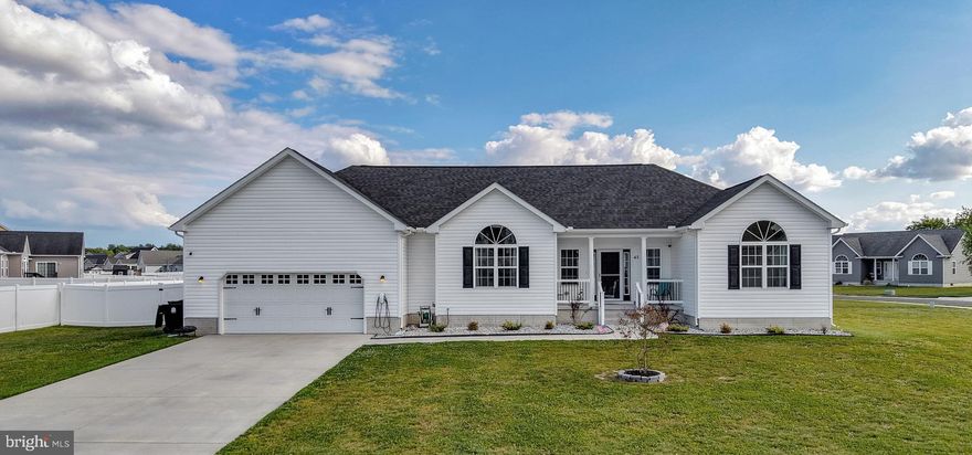 Welcome to the desirable Weatherstone Crossing community in Felton, DE. This charming ranch-style home offers the ease of single-story living with a bright, open-concept layout. Featuring 3 bedrooms and 2 full baths, the home includes updated luxury vinyl plank flooring, a spacious kitchen with island, and a convenient laundry room. The primary suite boasts a private en suite bath, while two additional bedrooms and a full bath are thoughtfully situated on the opposite side for added privacy.

Situated on a corner lot, the property provides ample outdoor space for gatherings and everyday enjoyment. A privacy fence creates the perfect setting for relaxing or entertaining, and the concrete patio is ideal for grilling and outdoor dining. Additional highlights include a Tesla/EV charging station for modern convenience.

Come see everything this home has to offer and envision your life here.
*Square feet is approximate. Buyer due diligence.