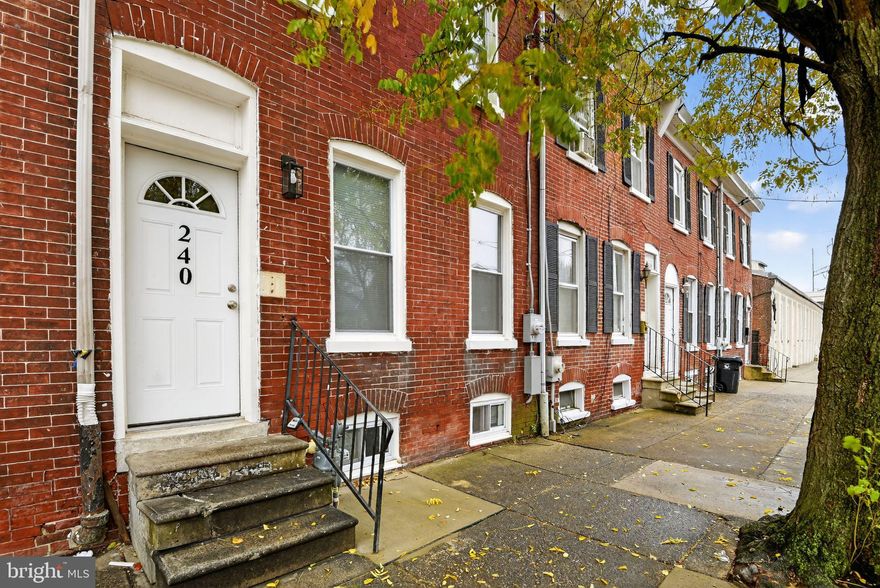 Welcome to the Southeast side of the City of Wilmington!  Flanked by the river and old mill structures that have become new again with life and close proximity to the Central Business District in Wilmington with a hustle and bustle of nightlife, work and other play options along the Riverfront as well!  This all brick row home has been thoughtfully renovated from the brick in and represents old world charm with new world lifestyle.  Open and flowing main level is graced with real hardwood flooring, no cheap snaps on tap in this rehab.  Natural light pours over the space and is supplemented with a bevy of recessed lights.  Kitchen with elongated rectangular tile floor under white shaker cabinetry, topped with quartz, and flanked with subway tile featuring a decorative inlay, and capped off with a stainless appliance package!  Down the hall you will embark upon a half bath to service both guests and owners alike.  A main floor versatile space that could be a bedroom or den/office is the last room up.  A fenced in rear grassy knoll for the warmer months off in the distance.  Second level is accessed via proper rise/run steps and is covered with comfy carpeting.  Three ample sized bedrooms with thoughtful storage elements all boast recessed lights that shine bright.  Full bath is covered in tile from floor to tub surround and offers contemporary finishes.  Everything is brand new inside this one; framing, duct work, plumbing, electric, drywall, trim, interior doors, paint, kitchen, baths, flooring, ETC.  Nothing left to do but pick your rooms and move in!