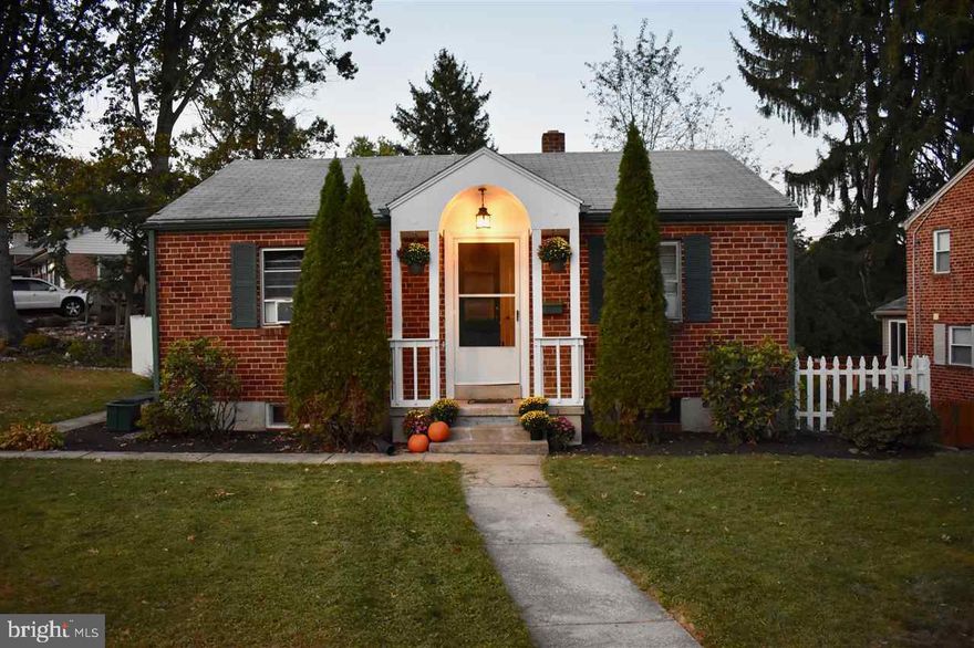 Cozy all brick ranch on a fenced in corner lot. Hardwood floors throughout. Finished room in lower level could be family room or third bedroom. Cute starter home comes complete with one year home warranty for your buyer's "peace of mind".