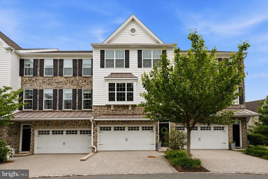 Welcome to 203 Corvus Circle in the sought-after Ravenscliff community of Media! This stunning Toll Brothers carriage-style townhome offers the perfect blend of modern luxury, comfort, and convenience. Built in 2018, this beautifully maintained 3-bedroom, 2.5-bath home features nearly 2,800 square feet of thoughtfully designed living space with an open-concept floor plan ideal for everyday living and entertaining.

The sun-drenched main level showcases gleaming hardwood floors, a spacious living area with a cozy gas fireplace, and a gourmet kitchen complete with stainless steel appliances, oversized island seating, abundant cabinetry, and stylish finishes throughout. Enjoy seamless indoor-outdoor living with two private decks — perfect for grilling, relaxing, or hosting guests.

Upstairs, the expansive primary suite serves as a private retreat with a large walk-in closet and spa-inspired bath featuring dual vanities and an oversized shower. Two additional generously sized bedrooms, a full hall bath, and convenient upper-level laundry complete the bedroom floor.

The lower level offers incredible flexibility with a bonus living space ideal for a home office, gym, media room, or playroom, plus a walk-out basement with soaring ceilings ready for future finishing possibilities. Additional highlights include a 2-car garage, zoned HVAC, and low-maintenance living with HOA-covered lawn care and exterior maintenance.

Located just minutes from downtown Media’s vibrant restaurants, shops, and train stations, with easy access to Routes 1, 476, Philadelphia International Airport, and Center City. Not to mention Rosetree Park and Dining Under the Stars waiting for you to enjoy this summer. This exceptional home delivers luxury living in one of Delaware County’s most desirable communities.