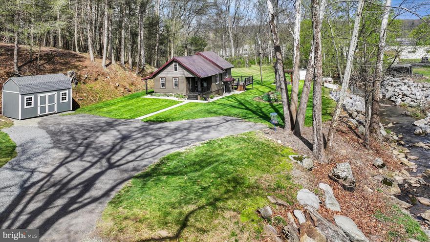 This adorable 2-bedroom ranch home in the Pine Grove Area School District is set on 2.7 acres in a peaceful, country setting. Located just across a charming bridge by a tranquil stream, this property offers a unique and inviting setting—and best of all, it is not located in a flood zone.

Cute as a button and full of charm, this home features replacement windows throughout and a brand new low-maintenance Trex deck (2025), perfect for relaxing and enjoying time with family and friends.Enjoy peace of mind with a metal roof installed in 2016, with one side recently updated in 2024. A brand new shed provides additional storage, while the spacious yard offers plenty of room for children and pets to play, or for hosting a game of horseshoes or cornhole.

Conveniently located just minutes from town, Interstate 81, the Swatara Rail Trail for avid cyclists and hikers, and the Appalachian Trail, this home offers both serenity and accessibility.

Whether you’re looking for a full-time residence or a cozy weekend getaway, this property is one you won’t want to miss!