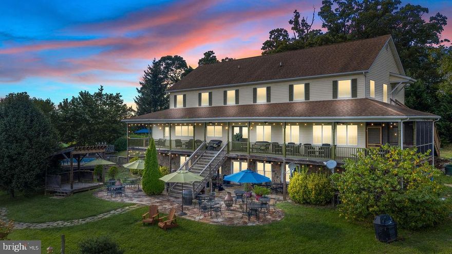 THIS IS IT!  The whole package.  Can you believe that this is only about an hour from DC?  So much privacy and beauty and it's located just inside Clarke County nestled at the foot of the Blue Ridge.  Enjoy tiny taxes on a large estate.   Large spaces and up to 7 bedrooms and 7 baths give this incredible home the flexibility to do just about anything you desire.  Located just about a mile north of Route 7, this property offers quick access to commuter routes, the Shenandoah River, shopping, health care, and great schools.