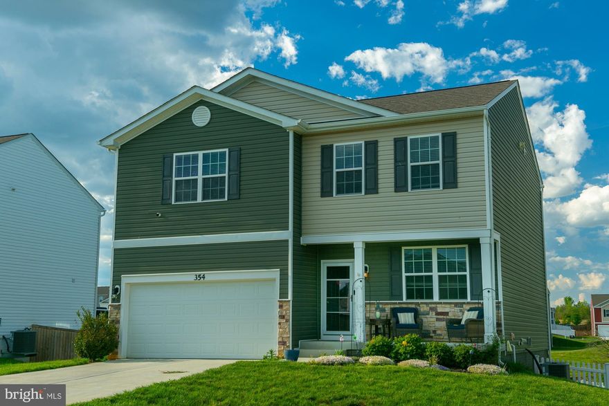 Stunning commuter-friendly home with 4-lane access to Northern Virginia via US-340 S to Berryville (currently under construction). Nestled backing to serene common area, this beautifully maintained property features a finished walkout basement with the option to add a 5th bedroom—complete with a legal egress window. The gourmet kitchen showcases an oversized island and a generous pantry—perfect for entertaining. Upstairs hosts four spacious bedrooms and a convenient second-floor laundry. Outdoors enjoy a large, low-maintenance composite deck and a premium vinyl privacy fence—ideal for relaxing or hosting guests. Move-in ready and perfectly situated for style, comfort, and commute convenience.
