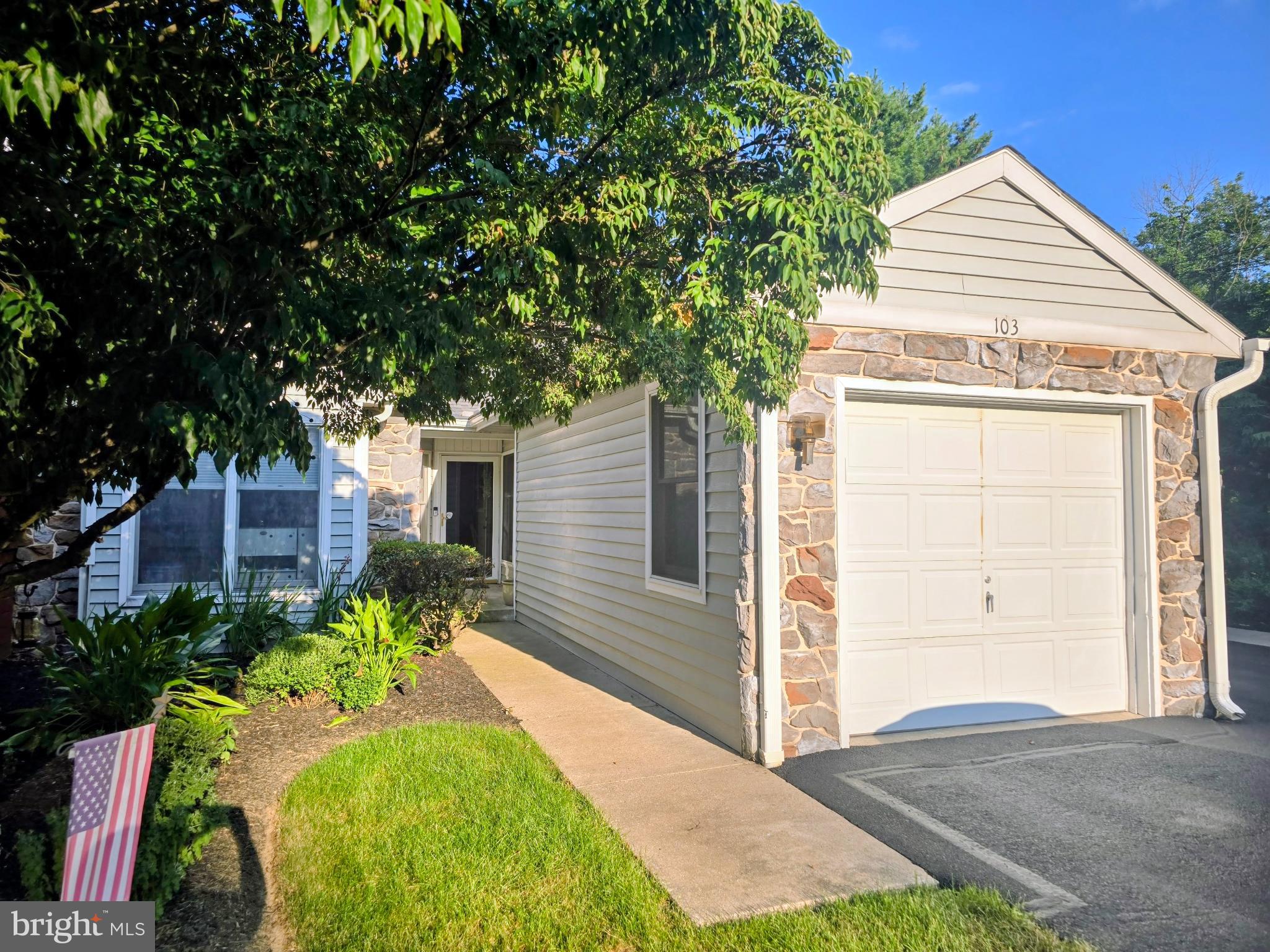 Nestled in the charming Stoneridge community, this beautifully renovated townhouse offers a perfect blend of comfort and modern living. Built in 1989 and thoughtfully updated in 2022, this home boasts an inviting atmosphere with a spacious open floor plan that seamlessly connects the living, dining, and kitchen areas. Step inside to discover a warm and welcoming interior featuring luxury vinyl plank flooring that flows from room to room and cathedral ceilings enhancing the home's aesthetic appeal. The living room is anchored by a stunning stone fireplace with beautiful mantle, perfect for cozy evenings spent with loved ones and holiday decorating! Natural light floods the space through numerous windows and a large skylight, creating a bright and airy ambiance throughout. The kitchen is equipped with new appliances, including a built-in microwave, dishwasher, and electric oven/range, and refrigerator, new quartz countertops, and a custom tile backsplash, making meal preparation a delight! The adjacent dining area is ideal for entertaining or enjoying casual meals, while the single level bedrooms provides convenience and accessibility. Two full bathrooms, both freshly remodeled, ensure comfort for all. The unfinished basement offers endless possibilities for customization, whether you envision a family room, home gym, workshop, or additional storage space. Step outside onto the deck from either the primary bedroom or the living room, where you can enjoy morning coffee or evening gatherings listening to the birds and taking advantage of the open common areas. The opportunity to live maintenance free enhances the appeal of this property with its well-maintained common areas, lawn maintenance, and snow removal services. The neighborhood is known for its friendly atmosphere and is conveniently located near local parks, providing ample opportunities for outdoor activities and relaxation. Additionally, you will be located less than a mile from the square and all that downtown Elizabethtown has to offer, making daily life convenient and stress-free. With an attached garage and driveway parking, this home offers both functionality and ease of access. Experience the perfect blend of comfort, community, and modern living in this immaculate home-your new sanctuary awaits!