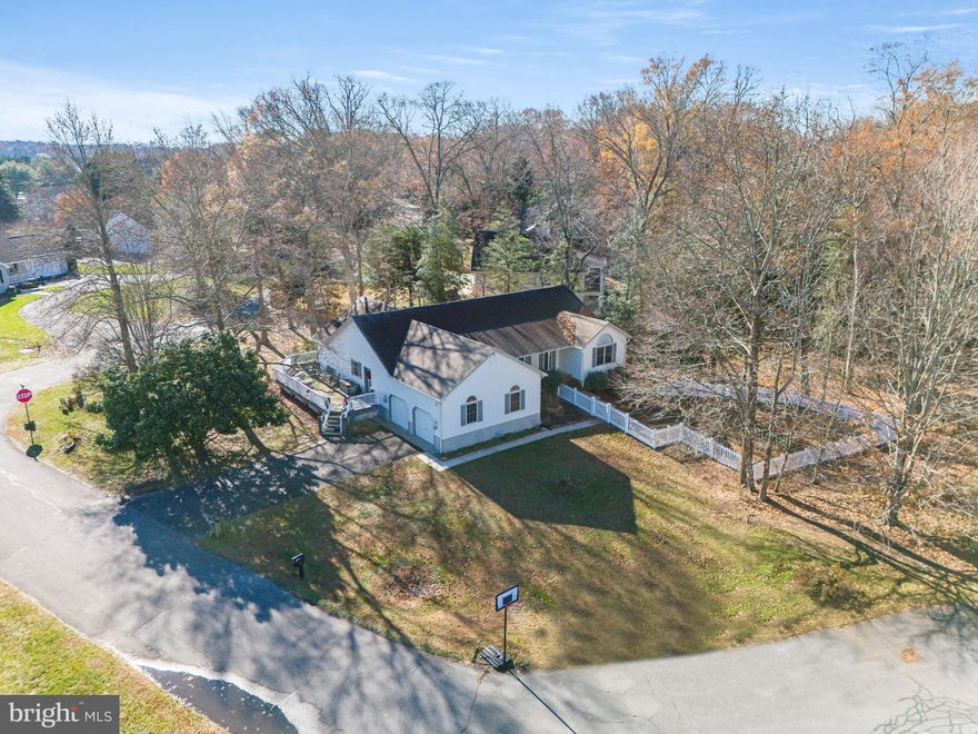 Maximize your investment with this beautifully updated 4-bedroom, 2.5-bath home, now priced below area comparables for an unbeatable value in Rehoboth Beach. This move-in-ready gem features a newer oven and dryer, 2019 HVAC with new ductwork, and durable Pergo Outlast+ flooring. The thoughtful split floor plan offers a private primary suite, while the spacious kitchen and sun-drenched living areas with skylights create a warm, inviting atmosphere. 

Set on a sprawling .61-acre wooded lot with a newly fenced backyard, the property provides rare privacy just under 10 minutes from the Rehoboth Beach Boardwalk. A standout feature is the separate entrance partial basement—ideal for a home gym or remote office—plus a large attic with finishing potential. With short-term rentals permitted and an HOA fee of just $350/year (including a pool and tennis), this is a premier opportunity for homeowners and investors alike. Come and see this home ready to enjoy this summer at the beach!