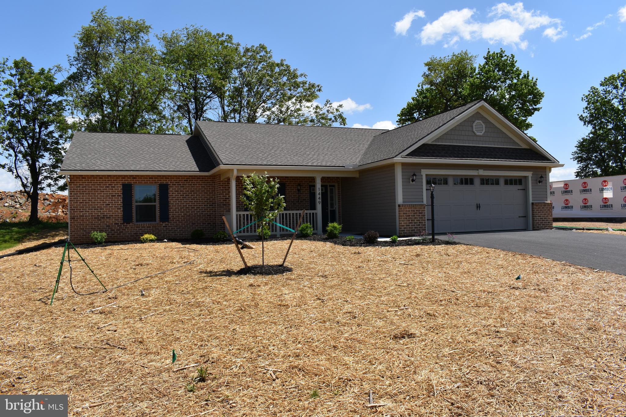 NEW CONSTRUCTION! - this one level, open floor plan, offers 3 bedrooms and 2 full baths. This home features beautiful custom flooring and a cathedral ceiling in the large living room. The kitchen boasts gorgeous granite counter tops, stainless steel appliances, a breakfast bar, and an adjoining dining area. A covered patio is also just outside the dining room. The Master bedroom is joined with a large master bath and a fabulous walk-in closet that leads into a laundry room with a sink.. Other features include an over-sized two car garage, a covered front porch, a covered 14 ft x 12 ft side patio, and a privacy tree line at the rear of the property.
This home is in Guilford Township and is within 2 miles of I-81, restaurants, shopping, medical facilities, schools, and the Chambersburg Aquatic Center. No HOA, No Township Taxes. Call today to schedule your personal tour!