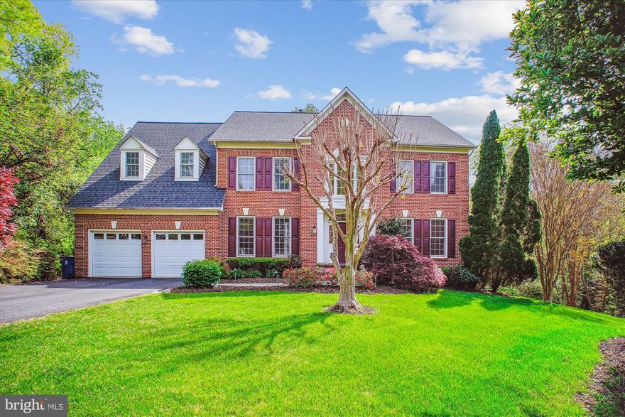 Beautifully designed classic Colonial home in a fantastic location, close to the heart of McLean at the end of a quiet cul-de-sac in prestigious Brynmawr Heights (no HOA). This 5-Bedroom home with 4 Full Baths plus Powder Room is bordered by parkland on one side yet is conveniently close to the center of McLean for restaurants and shopping.  The private back yard features a stepping stone path leading down to a charming stream which flows into the stream in neighboring Pimmit Run Park .....The MAIN LEVEL features a perfect floor plan with a 9 foot ceiling.... Enter this home via the two-story Foyer with a marble floor and you'll find a spacious Living Room, private Den / Office, large Dining Room, open Kitchen with stainless appliances, granite counters and central Island with a Wolf, 4 burner gas cook-top. The casual dining space flows to the large Family Room with wood burning fireplace and a ceiling fan. You'll find solid oak hardwood floors in all the main rooms on this level. The beautiful 4-season Sunroom addition was added in about 1999, featuring 4 skylights in the cathedral ceiling, a ceiling fan , 3 window walls and a ceramic tile floor. A Powder Room is conveniently located off the Foyer and the Laundry Room is located next to the entrance to the 2-car Garage.  The Garage features 2 door openers and wiring for an EV charger.  Access the huge upper deck on the back of the house, directly from the Family Room.... The UPPER LEVEL features the incredible Primary Bedroom with a separate Sitting Room, 2 walk-in closets and a wonderfuly large Primary Bath with step-in shower plus a jetted tub, private water closet and double sink vanity. You'll find 3 more bedrooms on the upper level (one with a private full bath) and a full Hall Bath at the end of the open hallway.  New carpets have been installed in all the bedrooms on this level.  All 4 upper level bedrooms have a ceiling fan and the entire interior was recently painted.... The LOWER LEVEL features two large Family Rooms, the 5th Bedroom, the 4th Full Bath, a huge Storage Room with plentiful shelving, two hanging closets, a wine rack and a wine cooler. You'll access a second huge Deck via a door from the Family Room.....  This property checks all the boxes for a solid, highly-desireable long-term home with great public and private schools.... Ideal for entertaining and also a great place for every-day, low-maintenance living with a front yard sprinkler system and exterior lighting..... The Sellers welcome your offer to purchase and can settle very quickly, so don't delay.