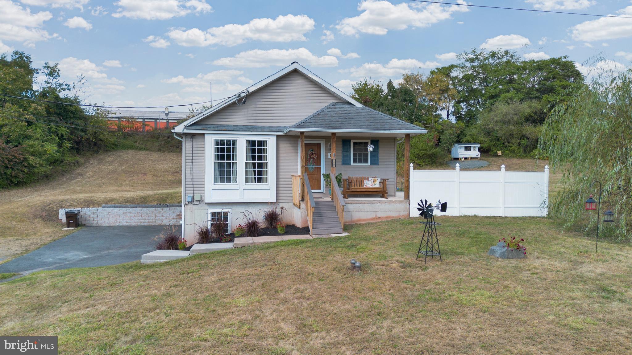 Welcome Home! This well-maintained 3-bedroom, 2-bath ranch home is one you don't want to miss!
The seller purchased the lot next door to provide even more outdoor living space and privacy. Combined, this home sits on .56 acres. The quiet location is ideal if you are seeking privacy but also need accessibility to all the area has to offer. You will immediately feel the warmth this home exudes with its open floor plan, hardwood flooring throughout, functional kitchen, and generously sized bedrooms. Great closet space and ample storage. The 20' x 30' patio and large level lot provides for enjoyable outdoor living/entertaining. Let’s not miss the garage ... it is not only oversized but has heating & cooling! The spacious basement is partially prepped to finish, adding to your living space if you desire. Enjoy country living with the included new chicken and goose coops. Contingent on sellers finding suitable housing, as they are moving out of state.