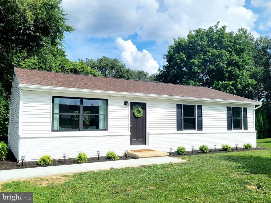 This wonderful home is back on the market!  Due to no fault of the property (family emergency with the original buyers). This beautifully renovated rancher in the north end of Hagerstown includes 3 bedrooms, 1 full bathroom, and a finished 240 sq ft room in the basement.  The living room is full of natural light and leads to a brand new kitchen with all new stainless steel smart appliances. The attached eating area opens to a new deck overlooking secluded tree lined back yard. New luxury vinyl plank floors throughout the entire home. Brand new bathroom with LVP marble floors.  Basement is partially finished, freshly painted and ready to become whatever form of extra space you need. It also contains a new 15x16 ft finished room.  Enjoy peace of mind with a brand new central air conditioning unit and all new replacement, energy efficient windows. The large new driveway can accommodate up to 5 cars. The spacious backyard is  walking distance to park. No HOA.  Easy access to interstates I-81 and Rt 70.