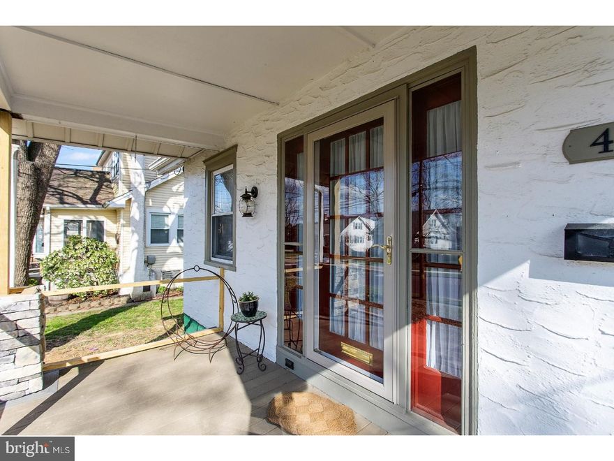 You'll say "WOW" when you see this beautifully updated two story bungalow on one of the quietest streets in the North Hills section of Glenside! Charming details are evident at every turn.  The first floor has the open floor plan and updated kitchen everyone desires today, refinished original hardwood floors and large living room wood burning fireplace! Just finished last year, the kitchen features plenty of cabinets, a ceramic tile back-splash, custom concrete counter tops and top of the line GE stainless steel appliances. It's open to the dining room and living room, great for entertaining and every day living.  Original hardwood floors are under the carpets in the bedrooms. The first floor also features a Master bedroom with en-suite full bath-currently used as a playroom. This could easily be used as  an office, master bedroom, guest suite... Upstairs you'll find 3 nicely sized bedrooms a full hall bath and a HUGE hallway storage closet. Tastefully painted and decorated, throughout. The recently redone front porch and back-yard patio with sitting wall add two great "outdoor rooms" to the property.  The current owners have lovingly updated and decorated this gem and hate to leave before planned, buy are moving to be closer to family.  Their loss is your gain!  Schedule your showing today! *The porch work will be finished very soon!