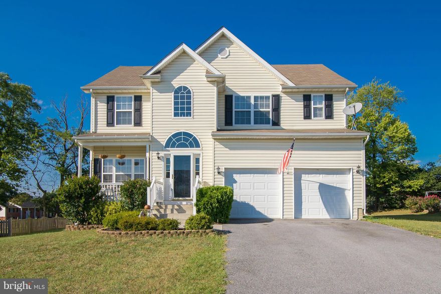 GREAT FAMILY HOME! The Open Floor Plan Features a 2 Story Great Room with Gas Fireplace / Kitchen & Breakfast Area / Formal Dining Room / Hardwood Flooring & Upgraded Cabinets / Great Master Suite with 2 Walk-in Closets, Soaking Tub & Separate Shower / Jack &  Jill Bath / Full Basement w/Rough In to Finish / Front Porch & a Great Patio for Entertaining, Yard Backs to Trees / $2500 Carpet Allowance