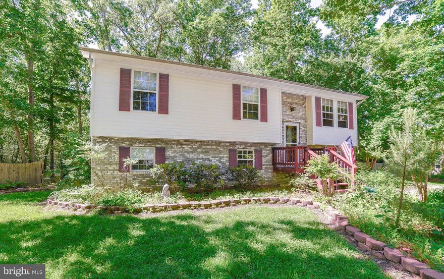 Beautifully maintained home-new upgraded kitchen with stainless appliances, new carpet and flooring throughout. Bathrooms are updated, master bath with vessel sink. Basement gives great additional space with wet bar and access to outside lanai for grilling. Very open and private backyard which backs to additional Lot 125R included in sale, increasing privacy. Double gate in front offers access to backyard. Sellers had home inspected prior to list and are now good to go! Safe in master closet will convey. Driveway will be sealed prior to closing. Sellers willing to pay some closing costs and provide a home warranty. Motivated sellers willing to entertain all offers. (sellers combined three lots to be their own)